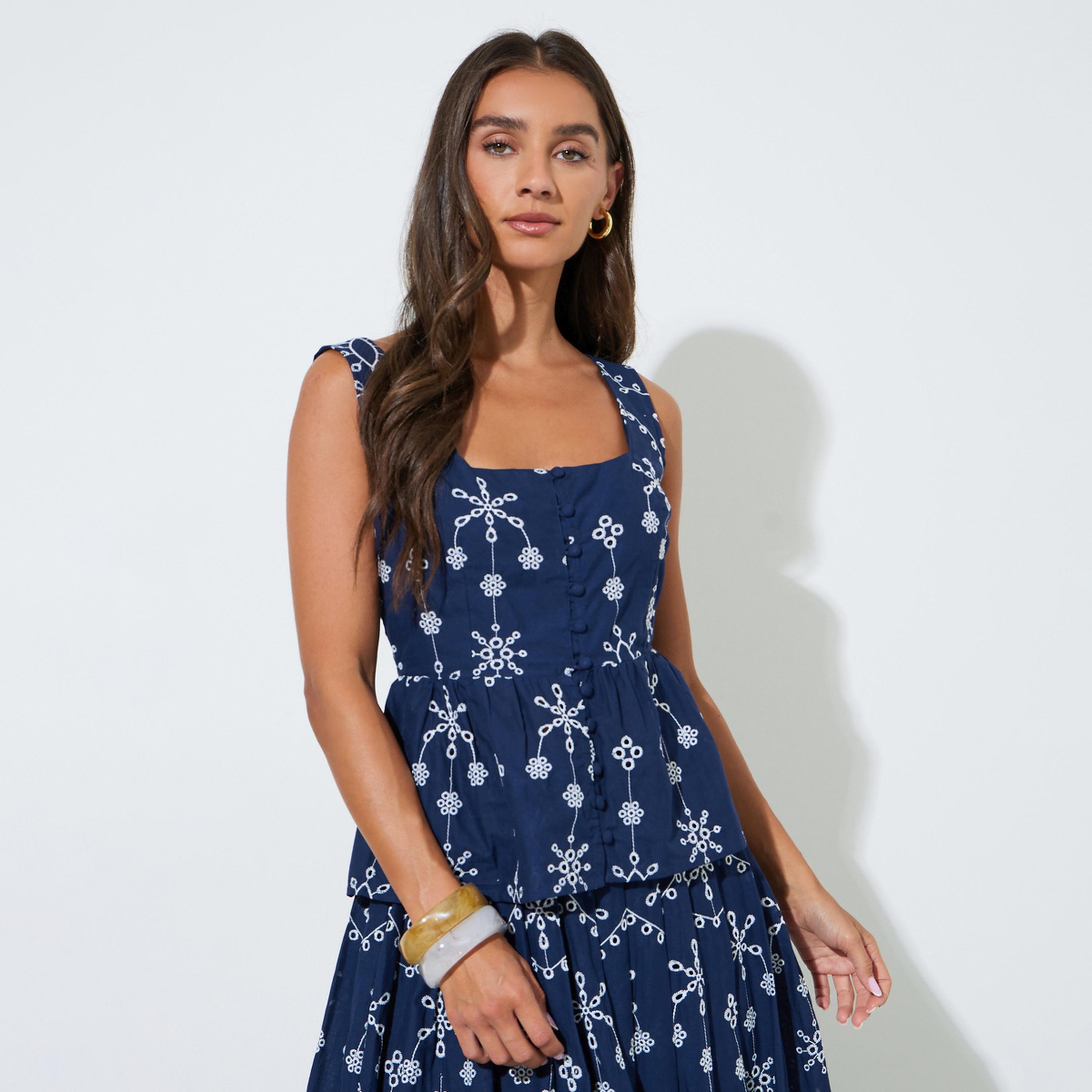 بلوزة بببلوم بلا أكمام بتفاصيل مفرغة باللون الكحلي-women-clothing-shirtsandblouses-blouses-image-1