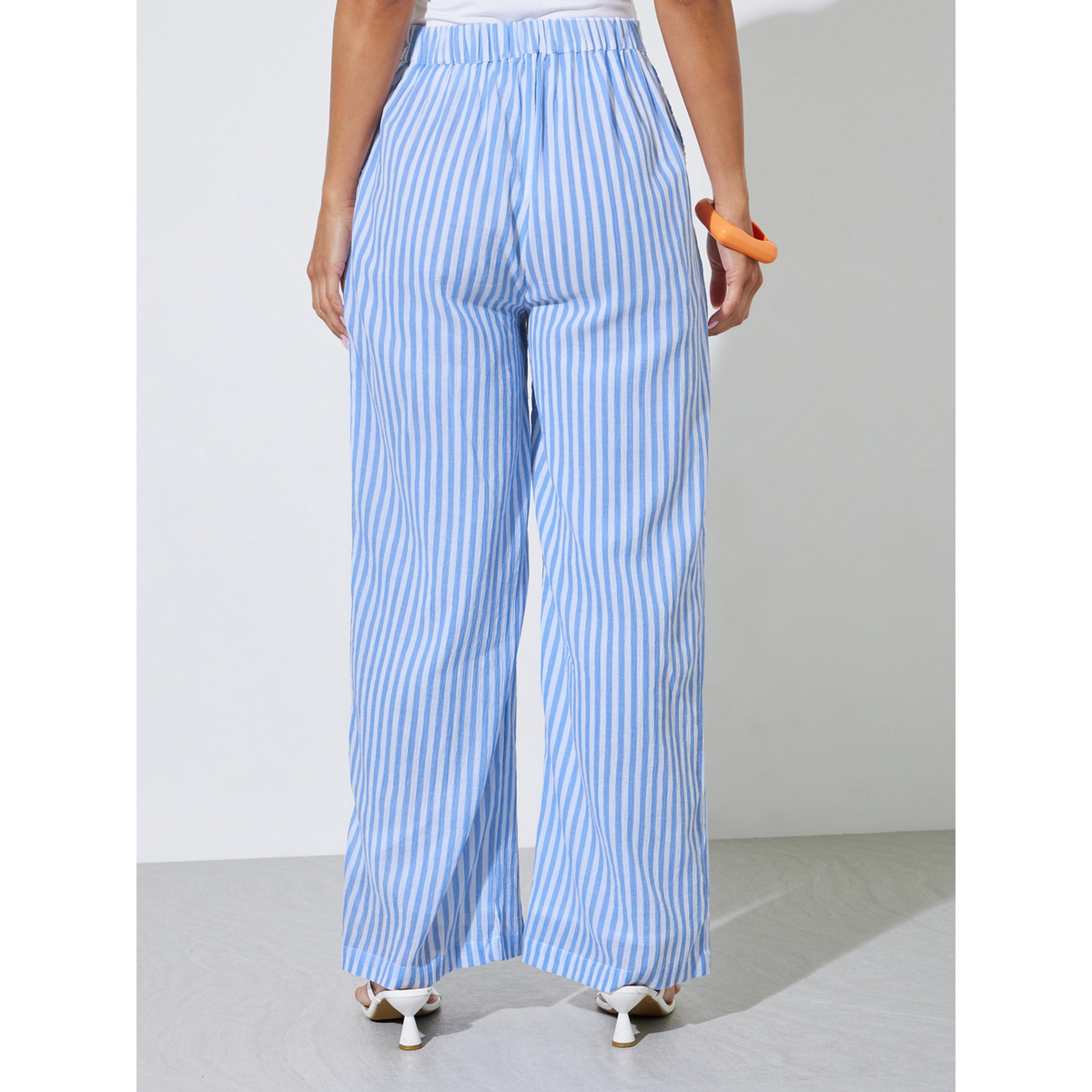 بنطال بأرجل واسعة ومخطط باللون الأزرق-women-clothing-joggers-image-3