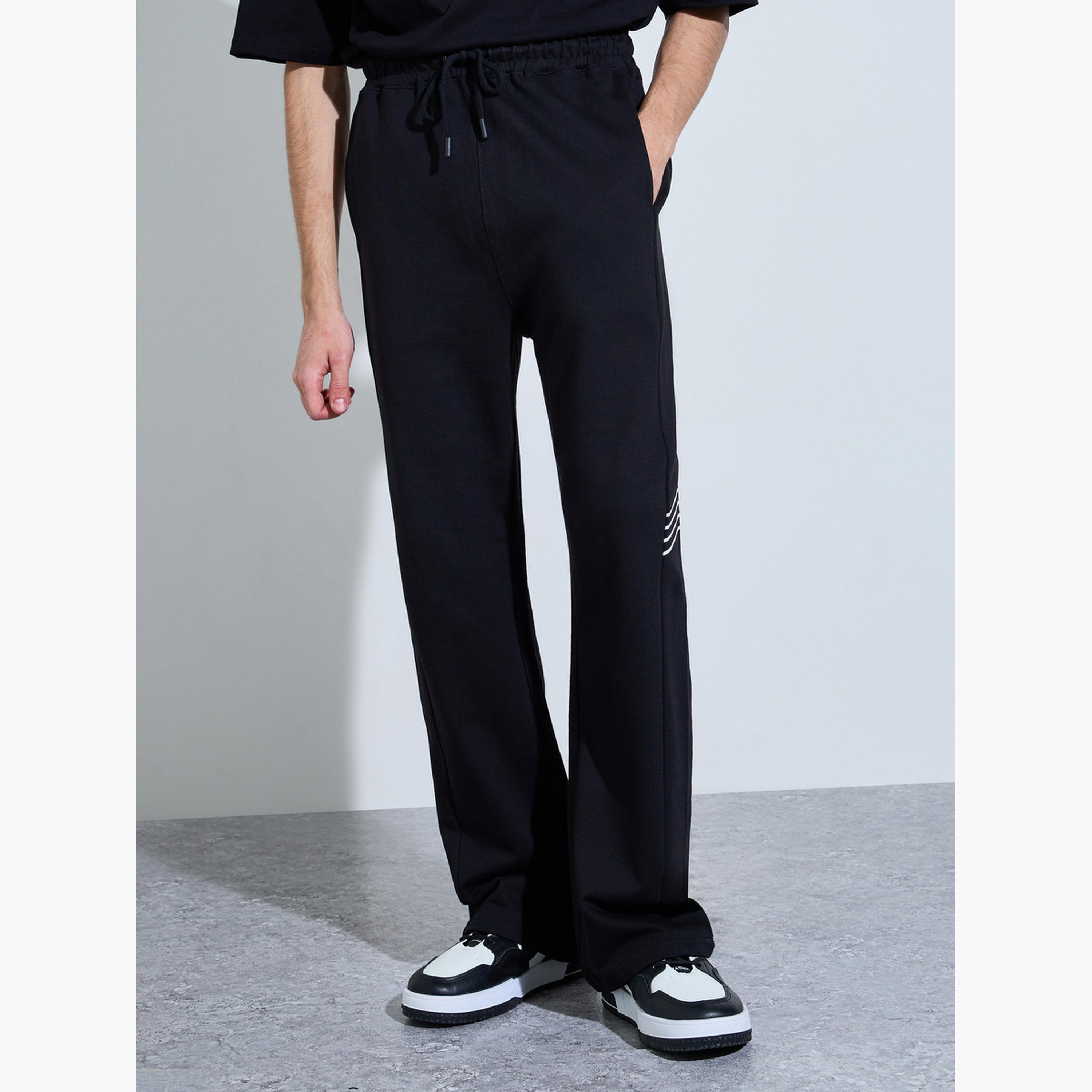بنطال جوغر تيري واسع بشريط جانبي-men-clothing-bottoms-joggers-image-1