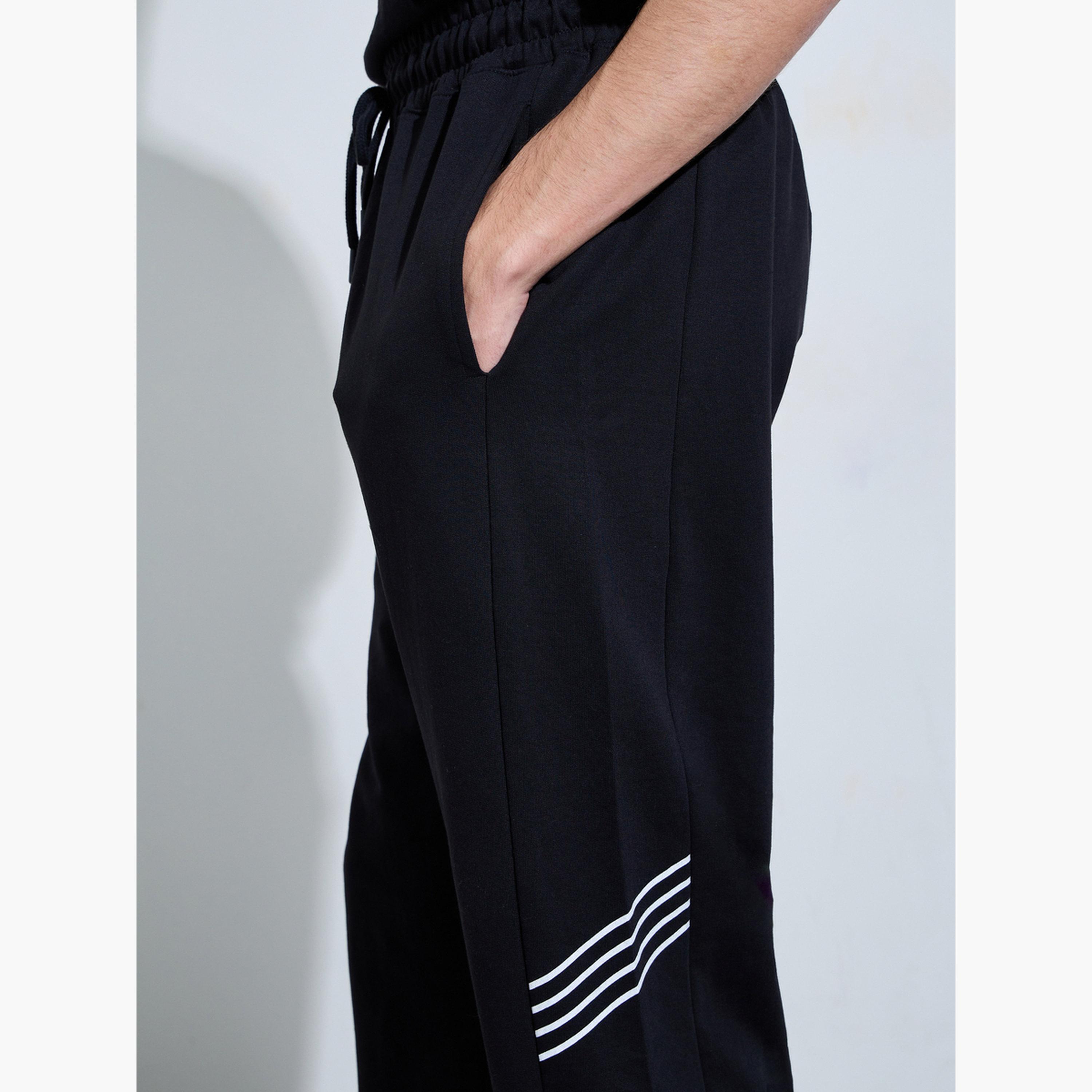 بنطال جوغر تيري واسع بشريط جانبي-men-clothing-bottoms-joggers-image-4