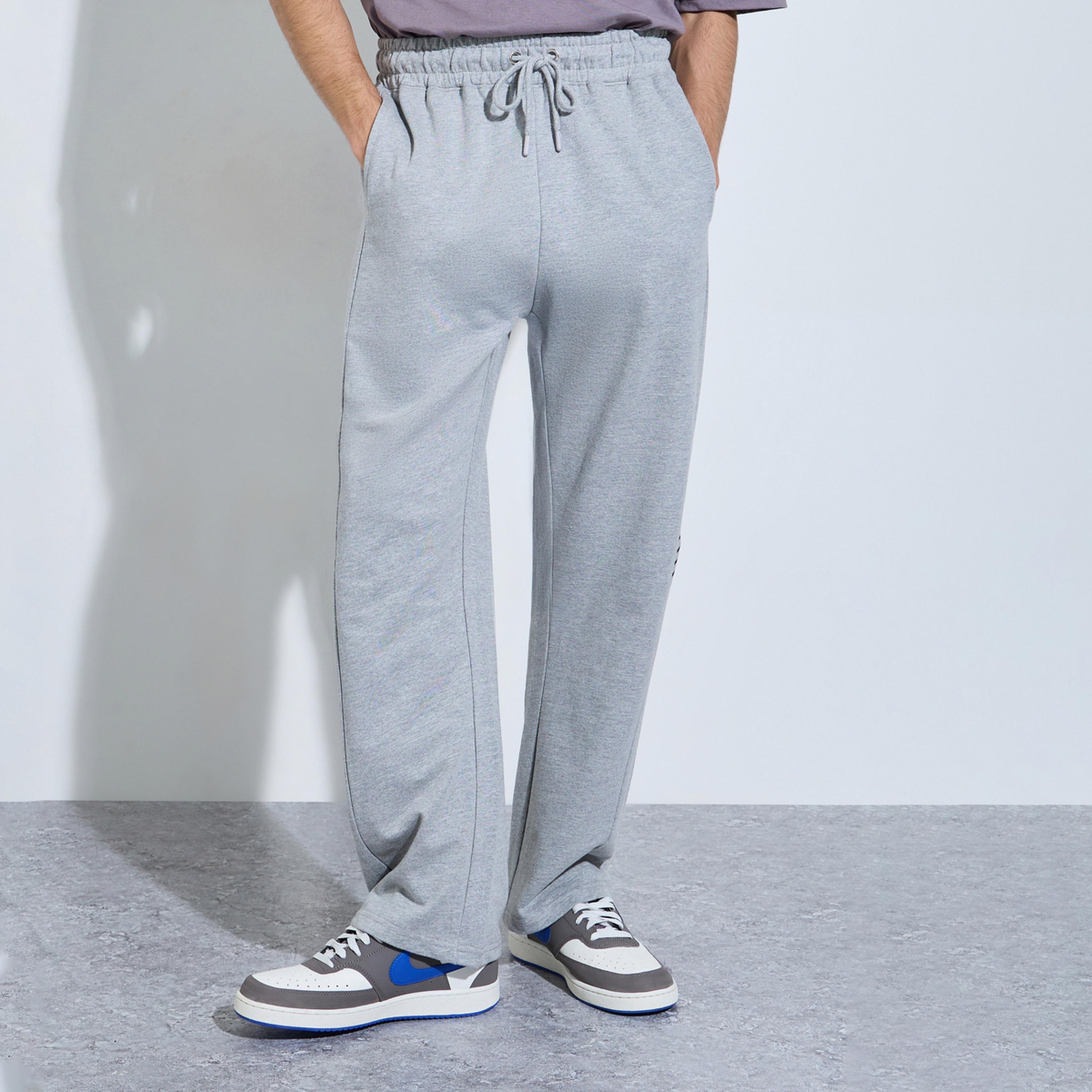 بنطال جوغر تيري واسع بشريط جانبي-men-clothing-bottoms-joggers-image-1