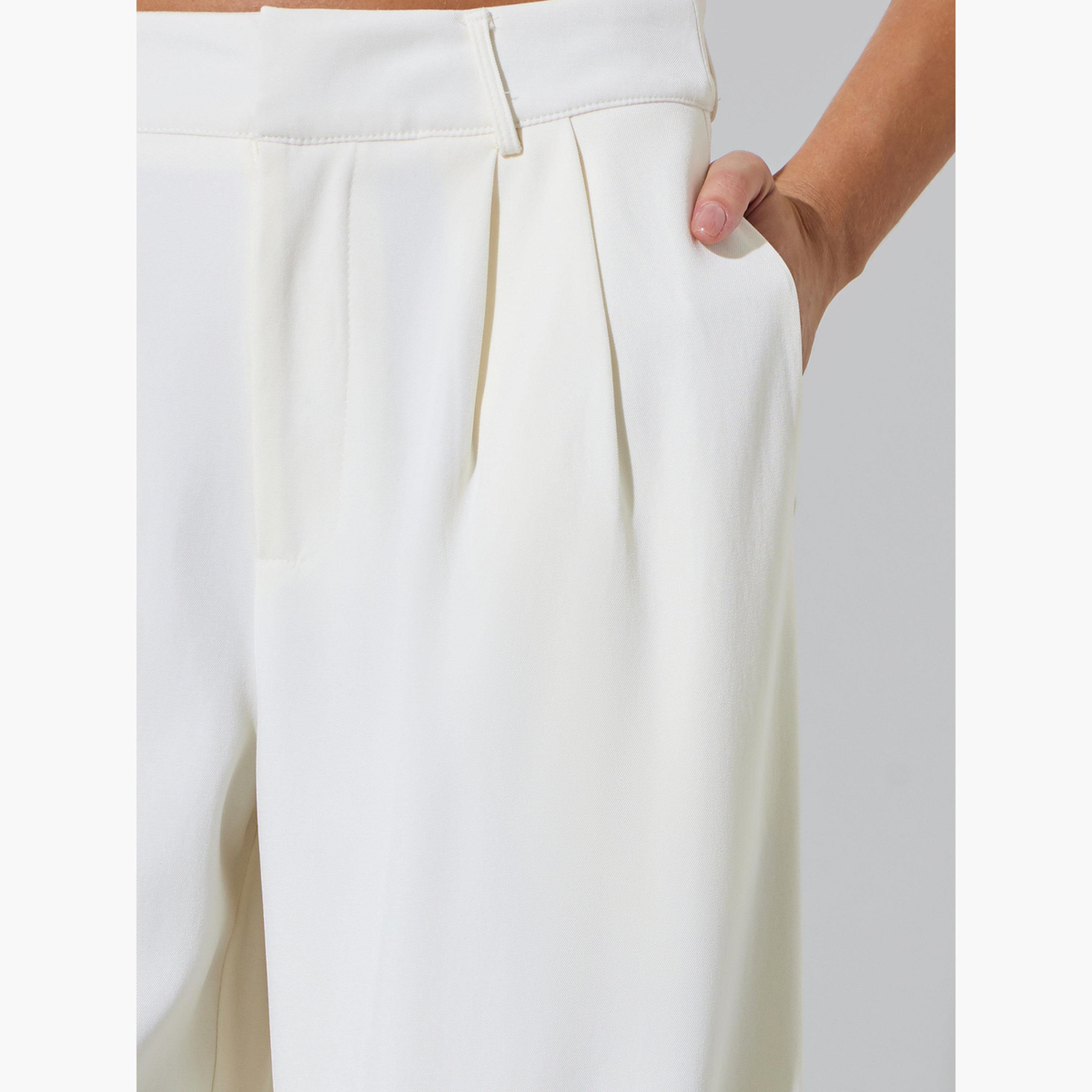 بنطال بأرجل واسعة وبكسرات بلون سادة لون أوف وايت-women-clothing-bottoms-trousers-image-3