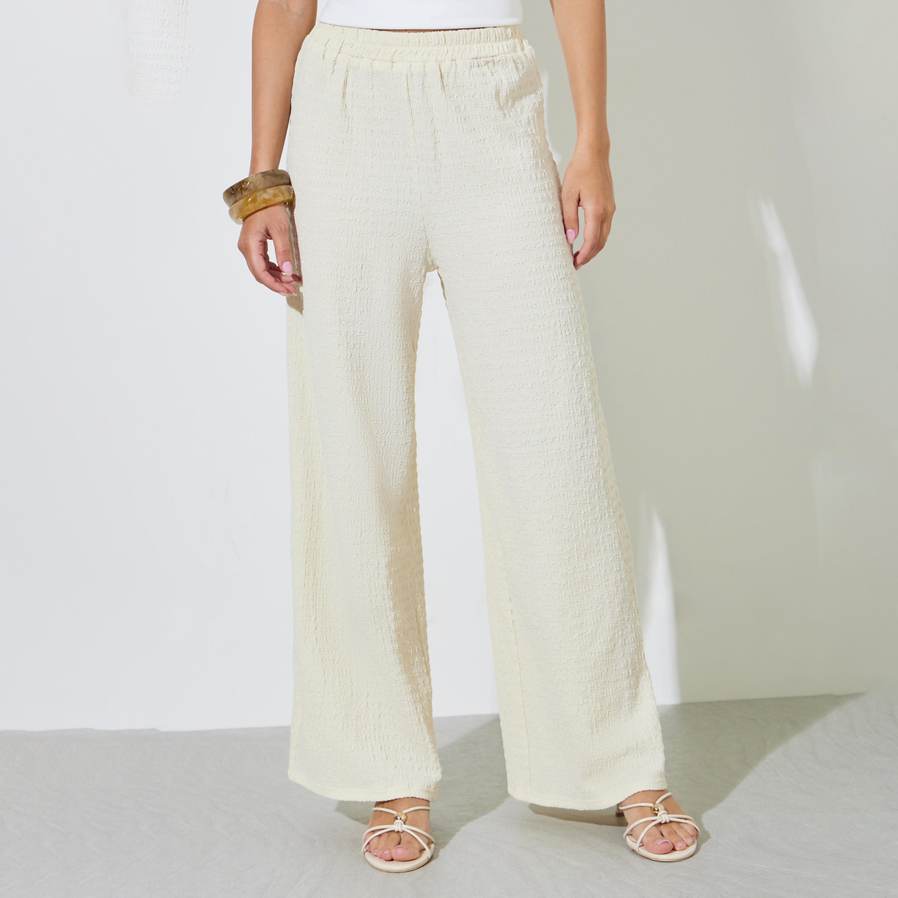 بنطال بأرجل واسعة محبوك بتفاصيل بارزة الملمس-women-clothing-trousers-image-1
