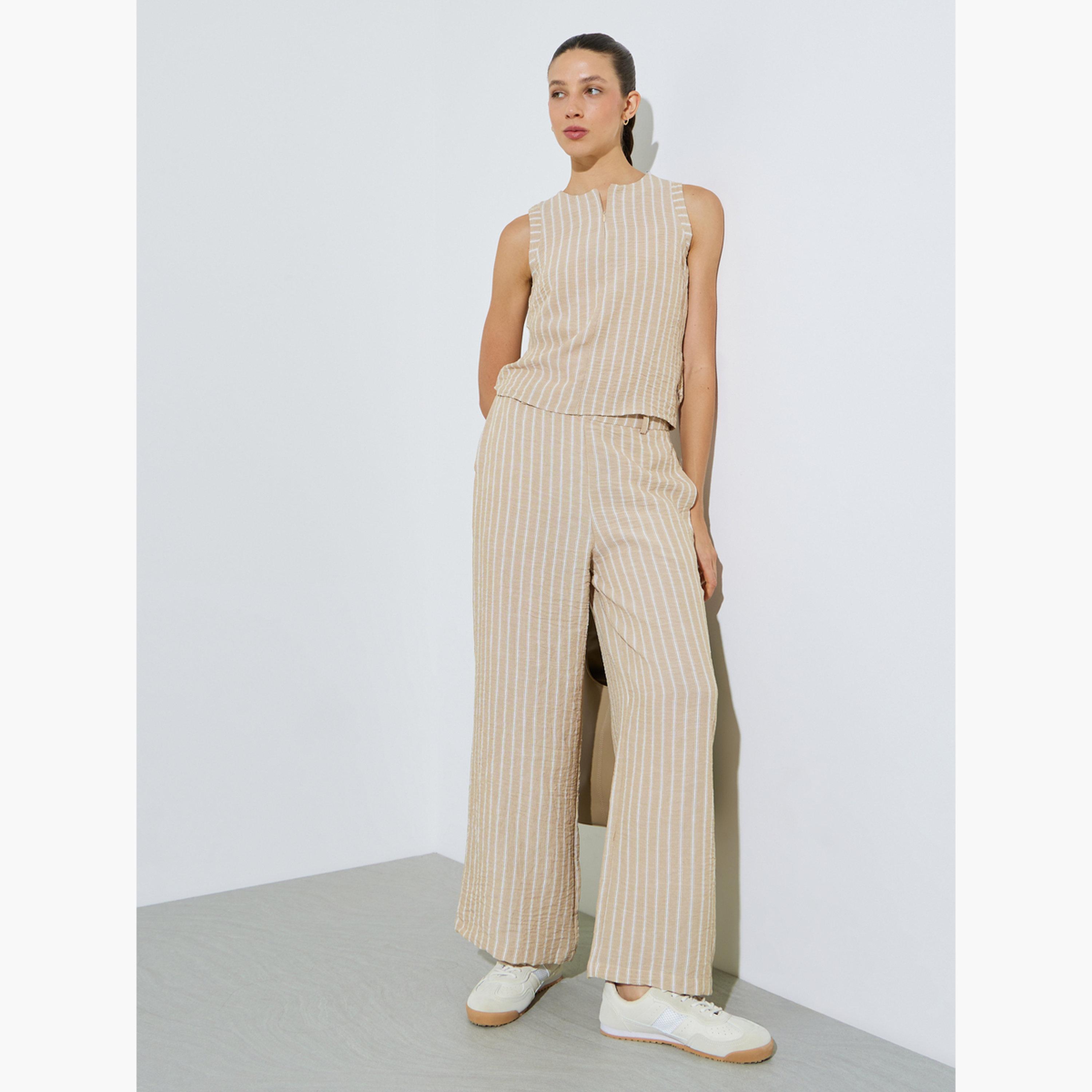 بنطال بأرجل واسعة ومخطط بيج-women-clothing-bottoms-joggers-image-2
