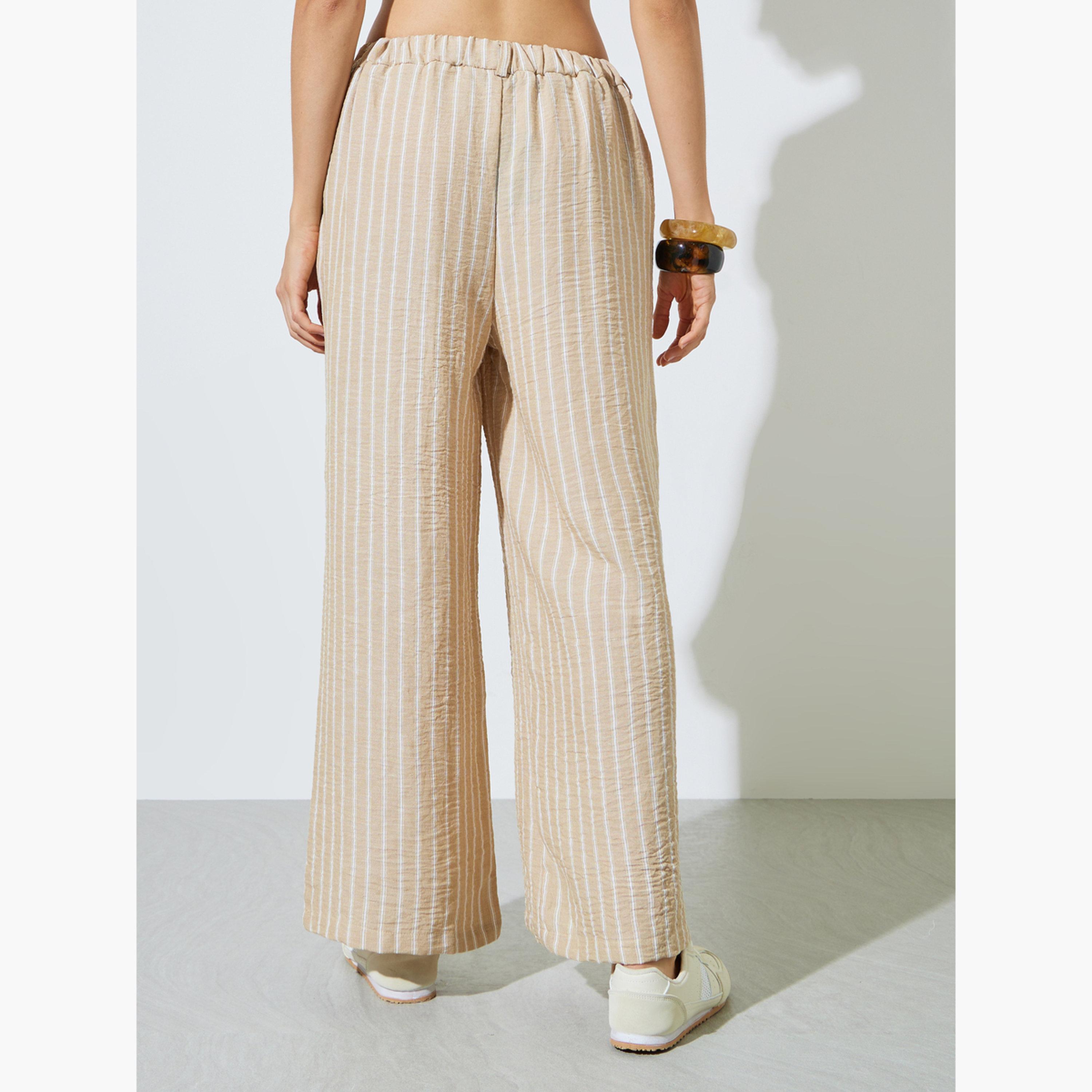 بنطال بأرجل واسعة ومخطط بيج-women-clothing-bottoms-joggers-image-4