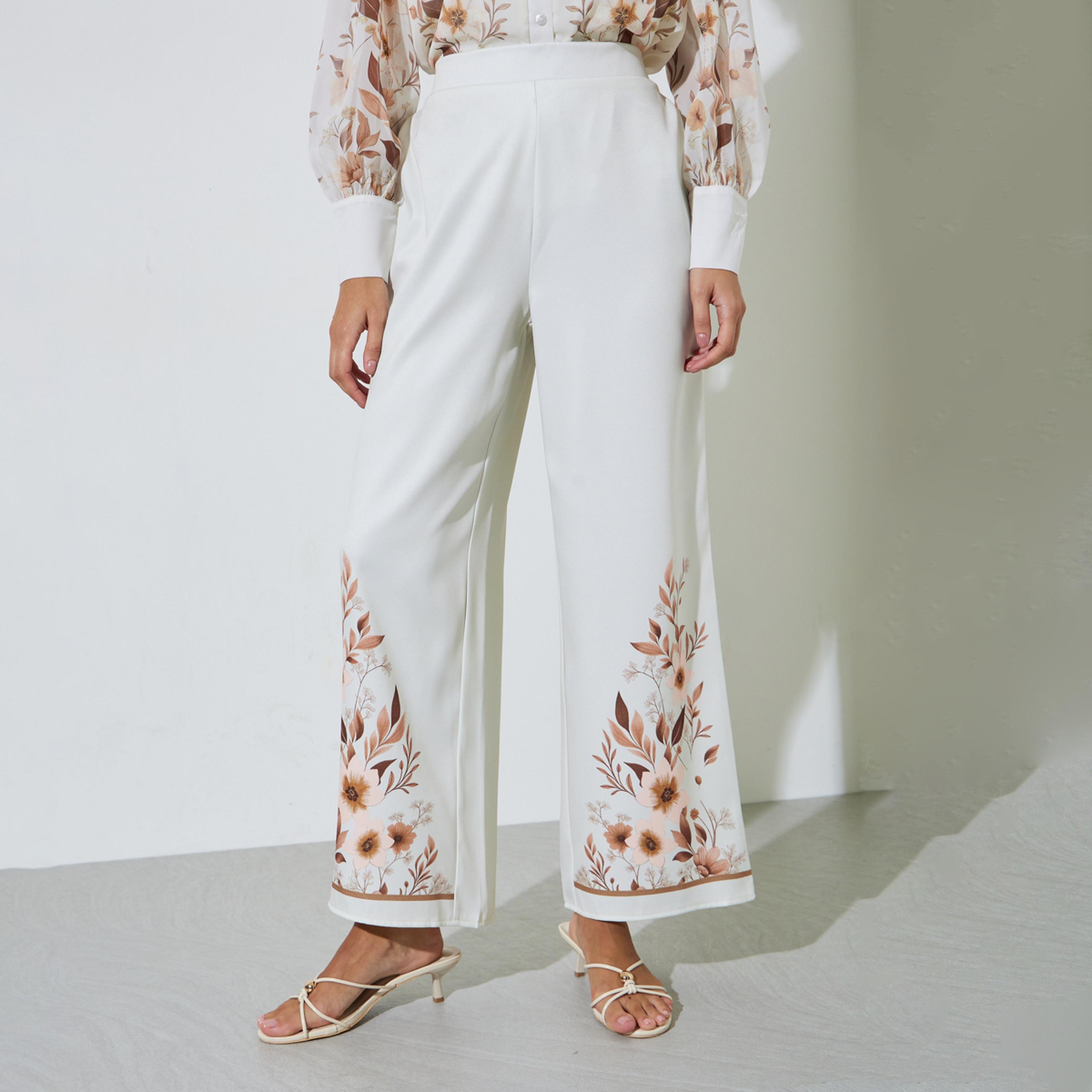 Styli Off White Floral Print Straight Fit Pants-women-clothing-bottoms-joggers-image-1