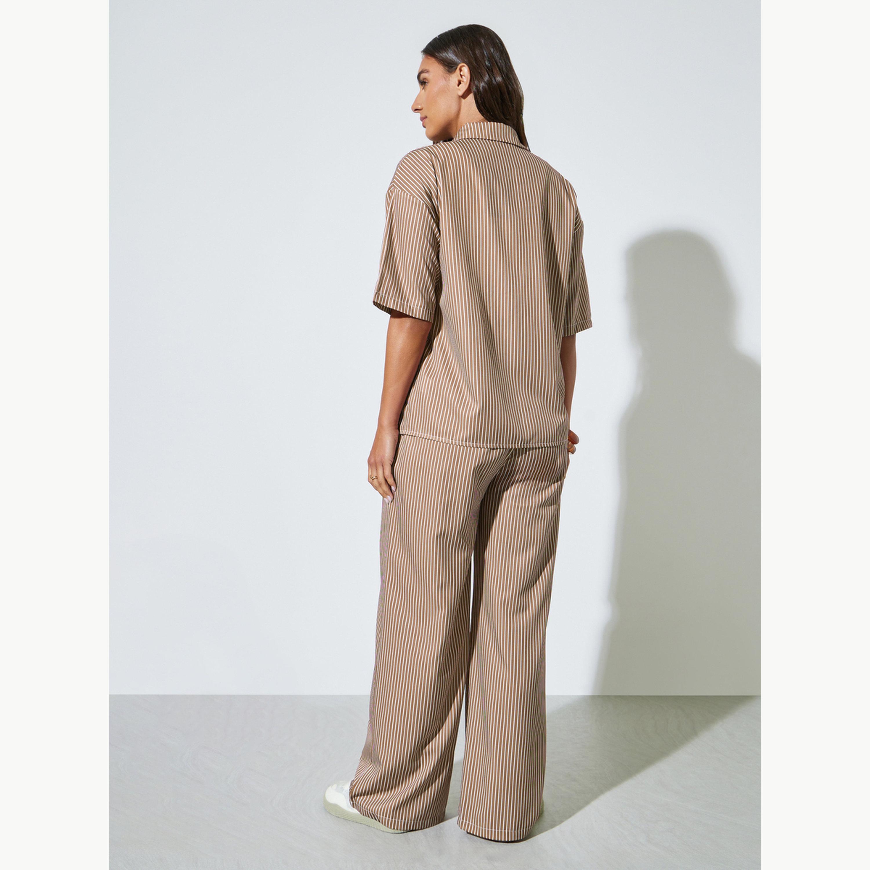مجموعة من بنطال بأرجل واسعة وبلوزة مخططة بقصة واسعة-women-clothing-coordsets-image-4