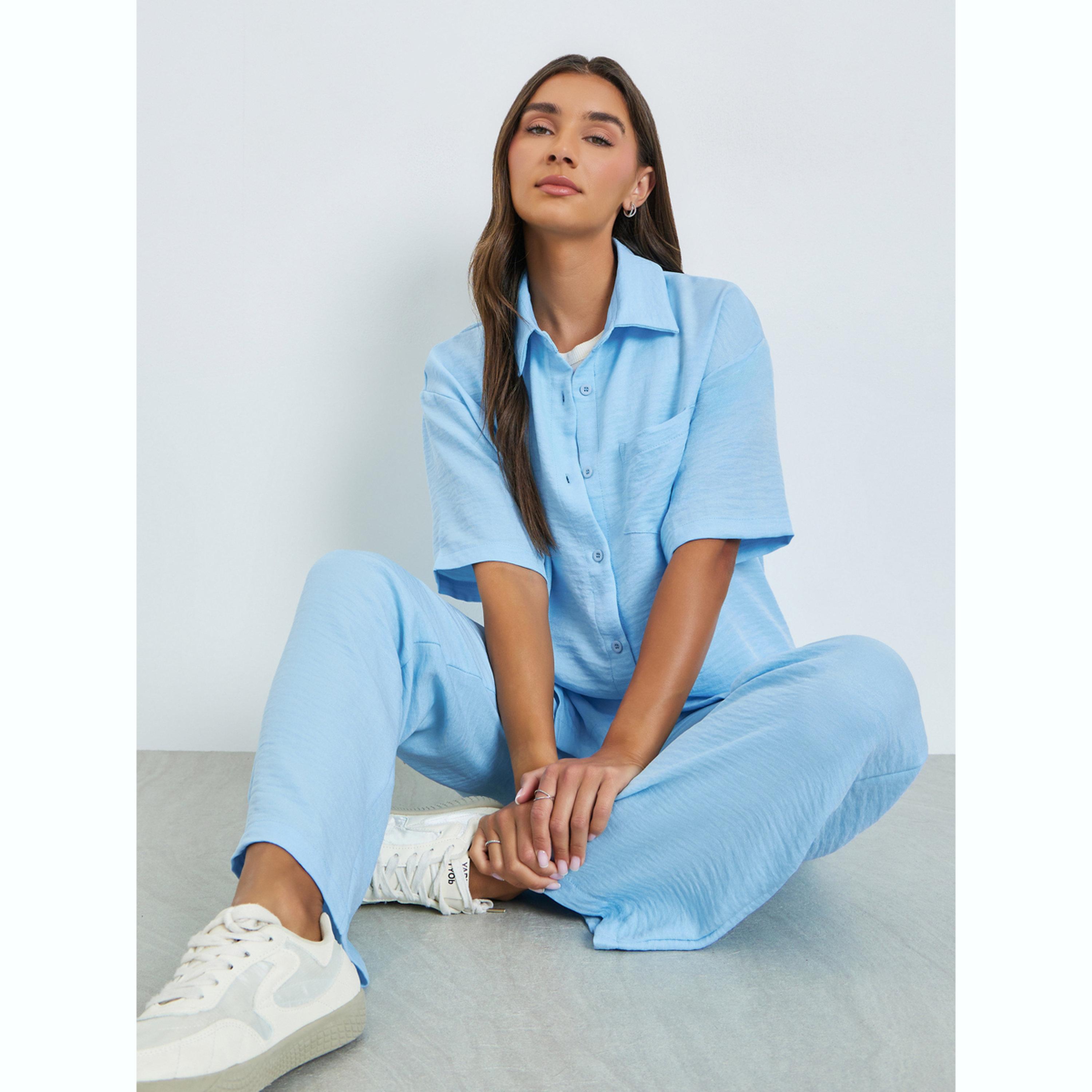 طقم منسق من بنطال بأرجل واسعة وقميص مريح بجيب أمامي-women-clothing-coordsets-image-2