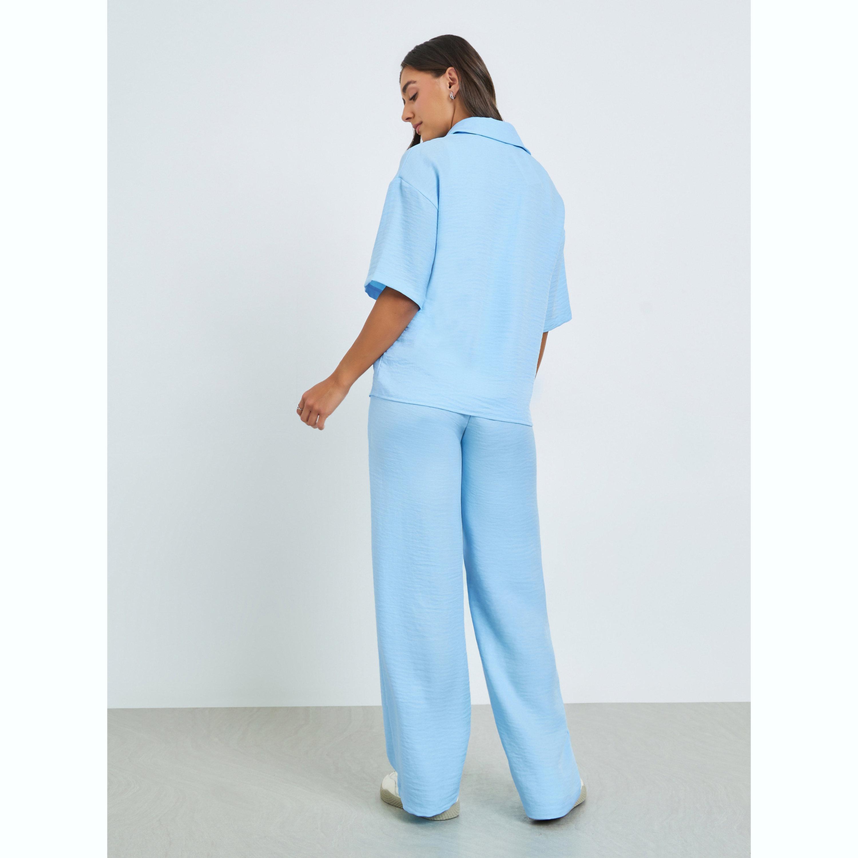 طقم منسق من بنطال بأرجل واسعة وقميص مريح بجيب أمامي-women-clothing-coordsets-image-4