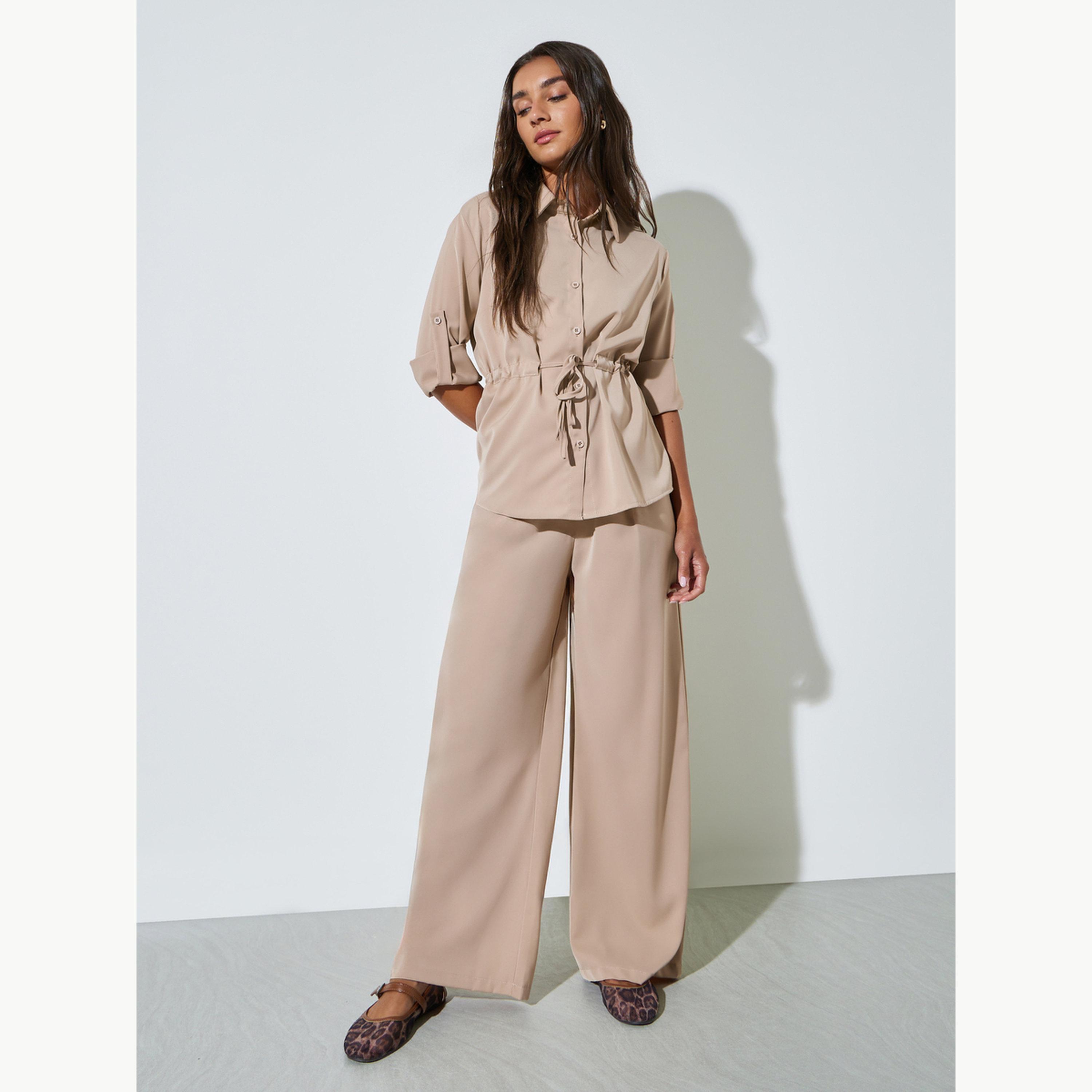 مجموعة من بنطال بأرجل واسعة وبلوزة بخصر برباط-women-clothing-coordsets-image-1