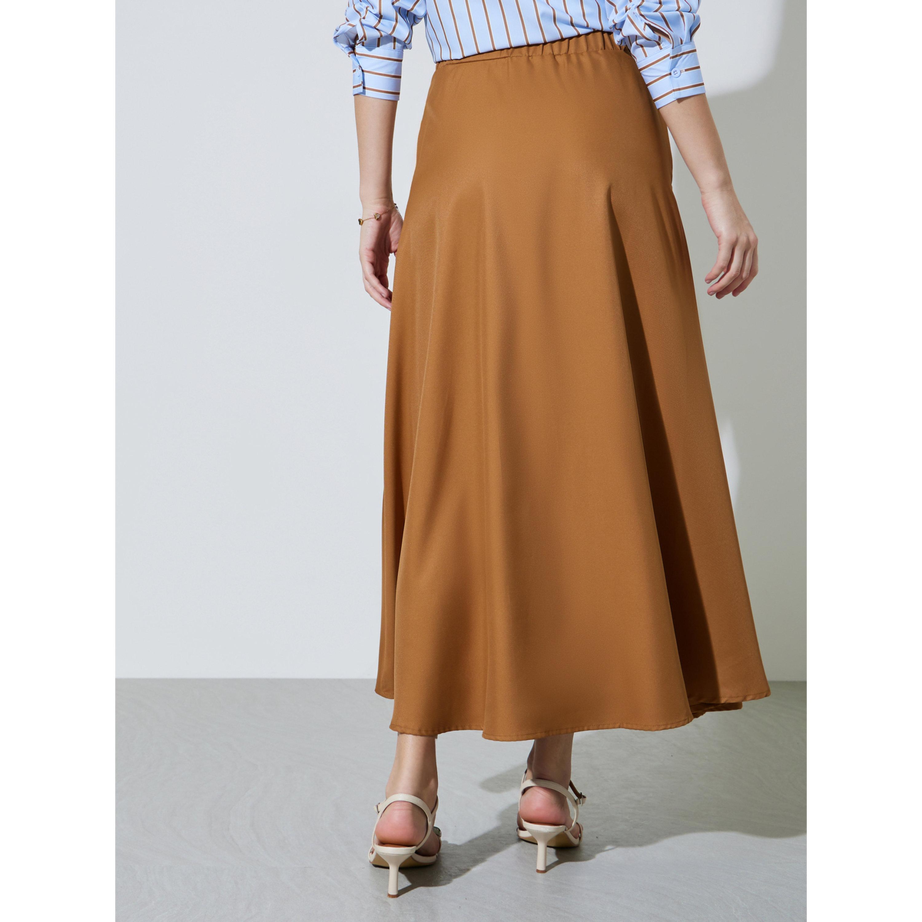 تنورة طويلة بحافة واسعة سادة وتفاصيل جيوب باللون البني-women-clothing-skirts-image-4
