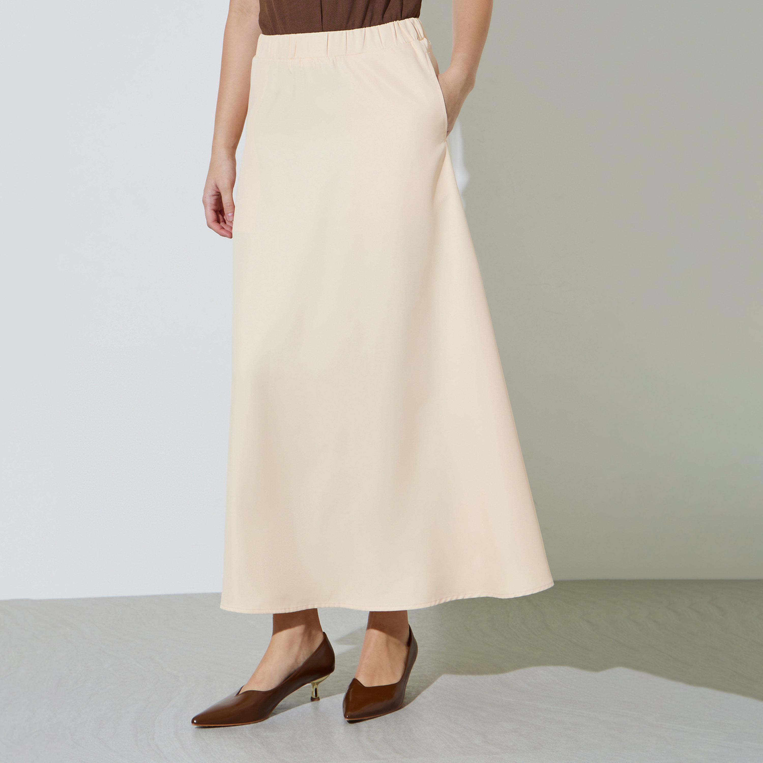 Styli Cream Solid Pocket Detail A-Line Maxi Skirt-women-clothing-skirts-image-1
