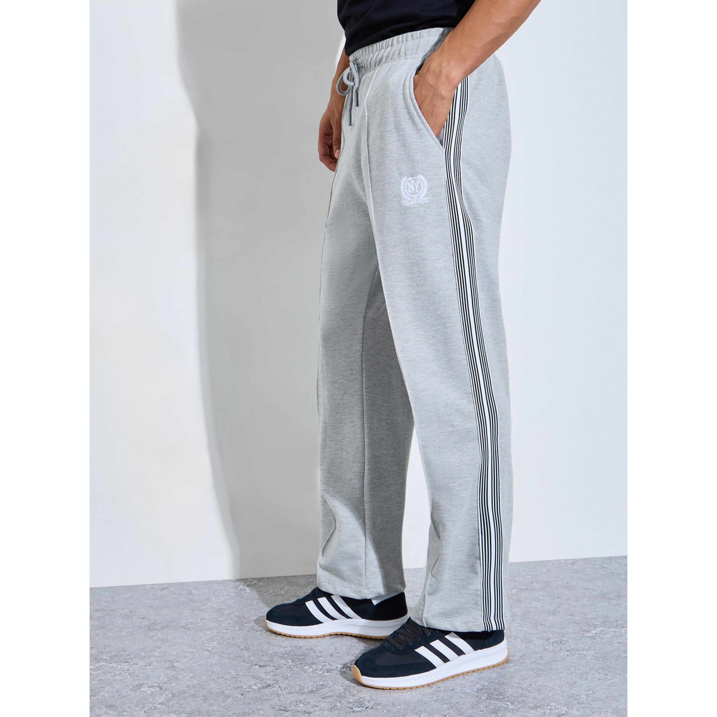 جوغر واسع بأشرطة جانبية وتفاصيل جيب-men-clothing-joggers-image-3
