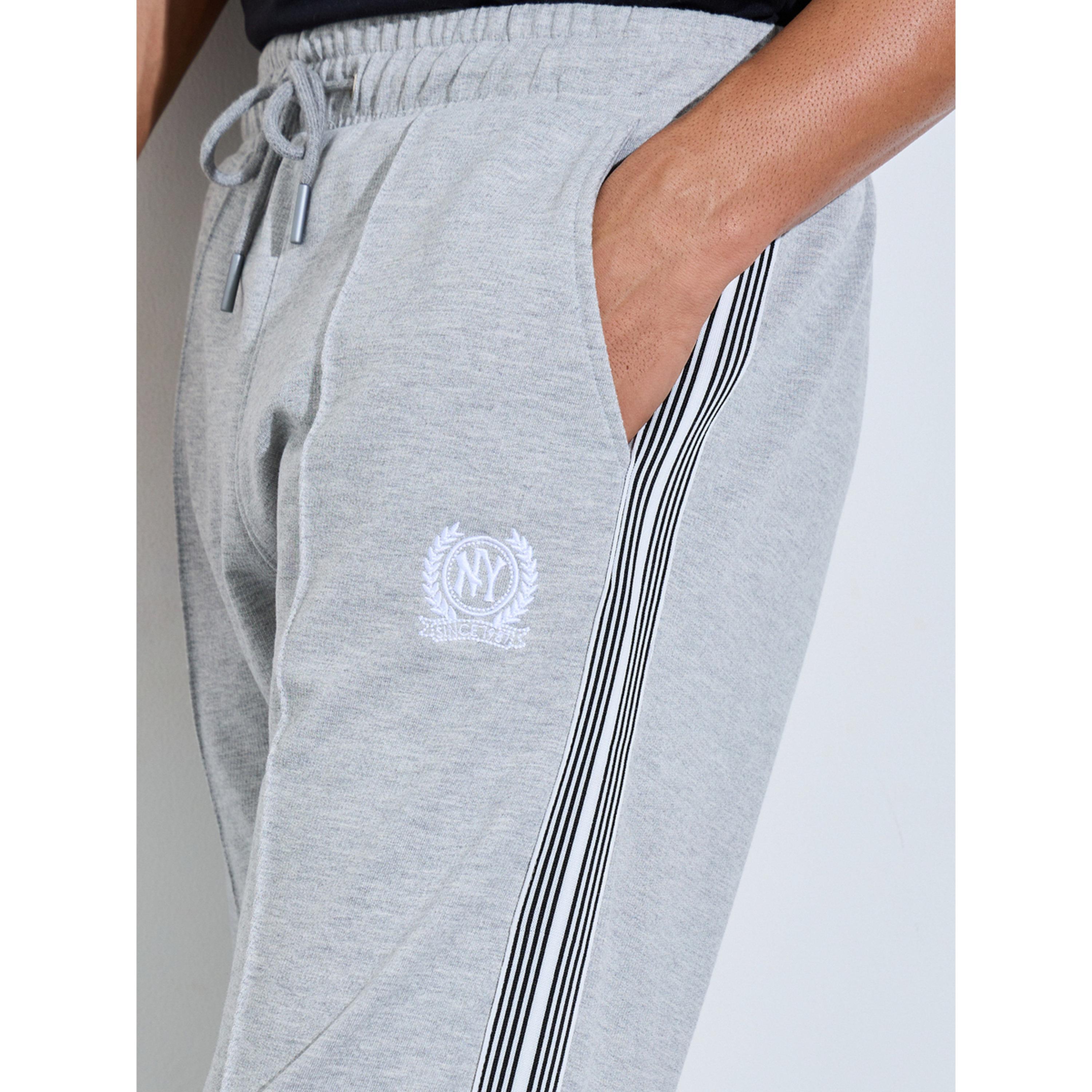 جوغر واسع بأشرطة جانبية وتفاصيل جيب-men-clothing-joggers-image-4