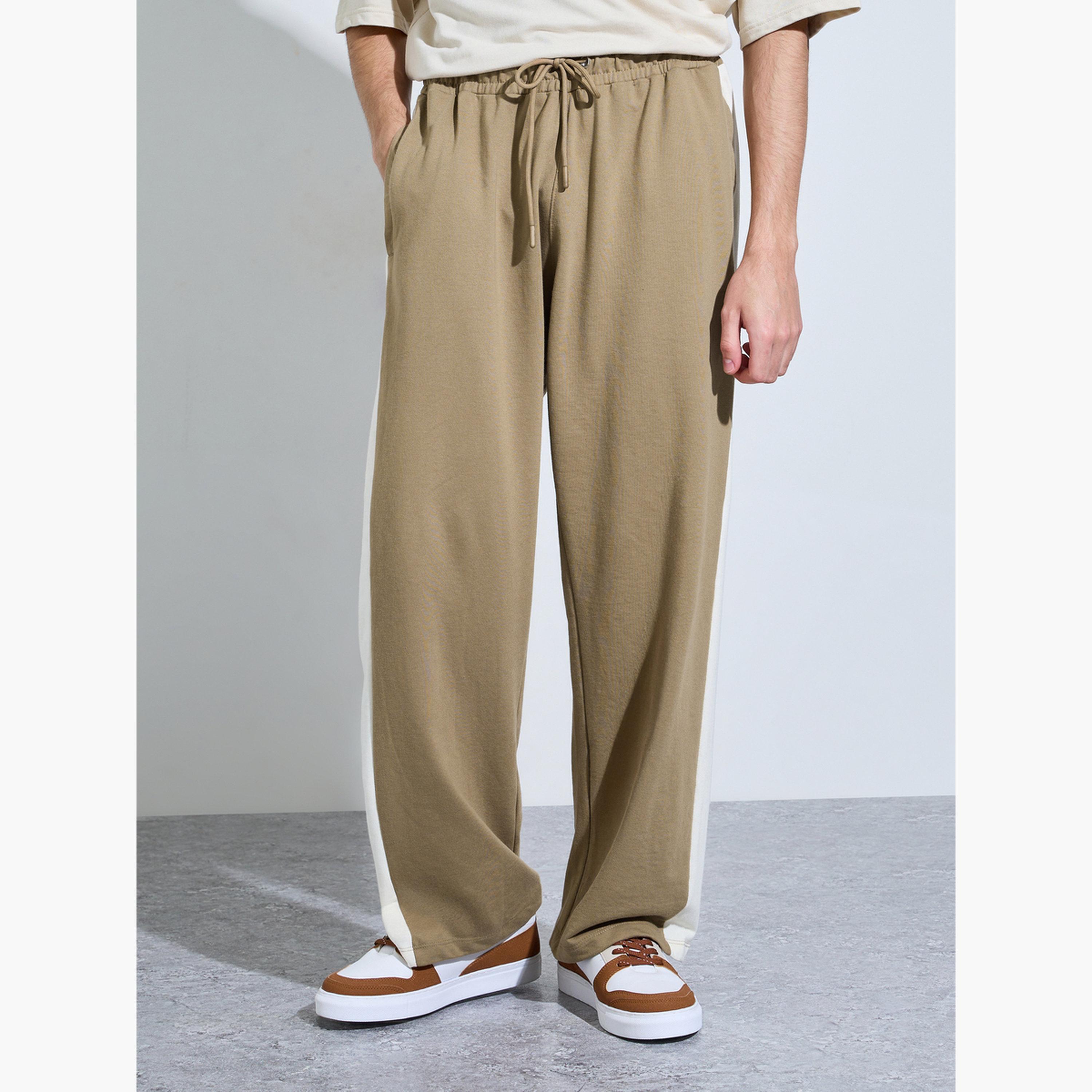 بنطال جوغر بقصة مريحة أجياب بسحاب وشريط جانبي-men-clothing-bottoms-joggers-image-1