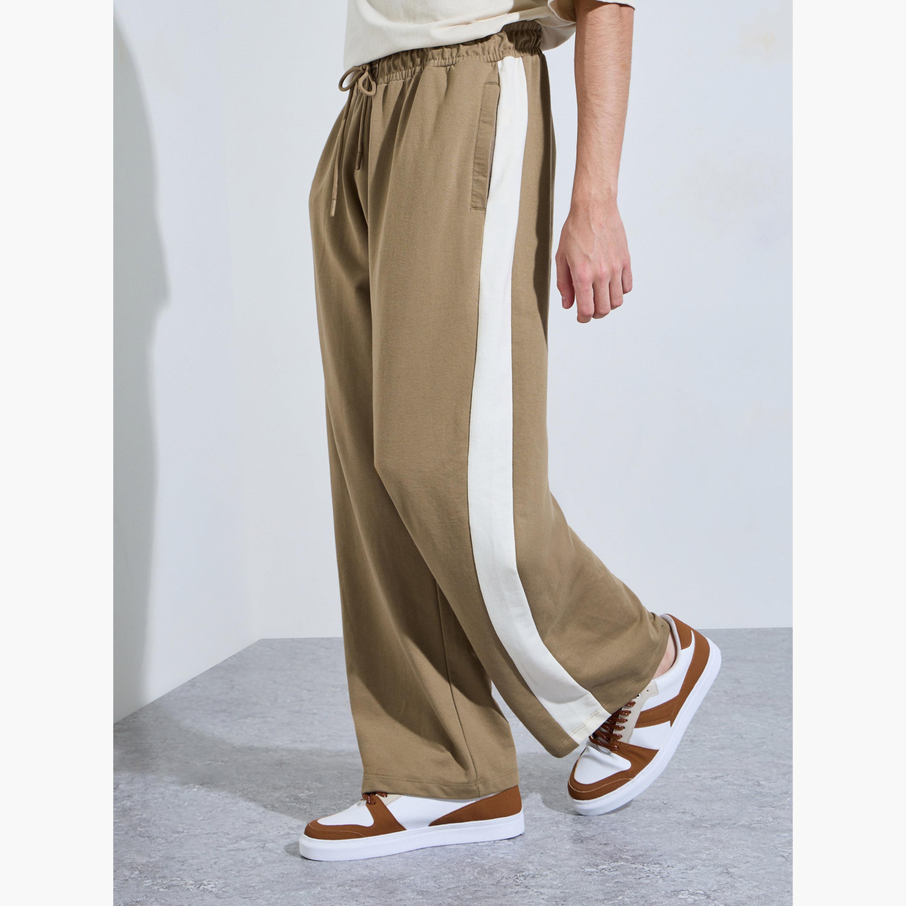بنطال جوغر بقصة مريحة أجياب بسحاب وشريط جانبي-men-clothing-bottoms-joggers-image-3