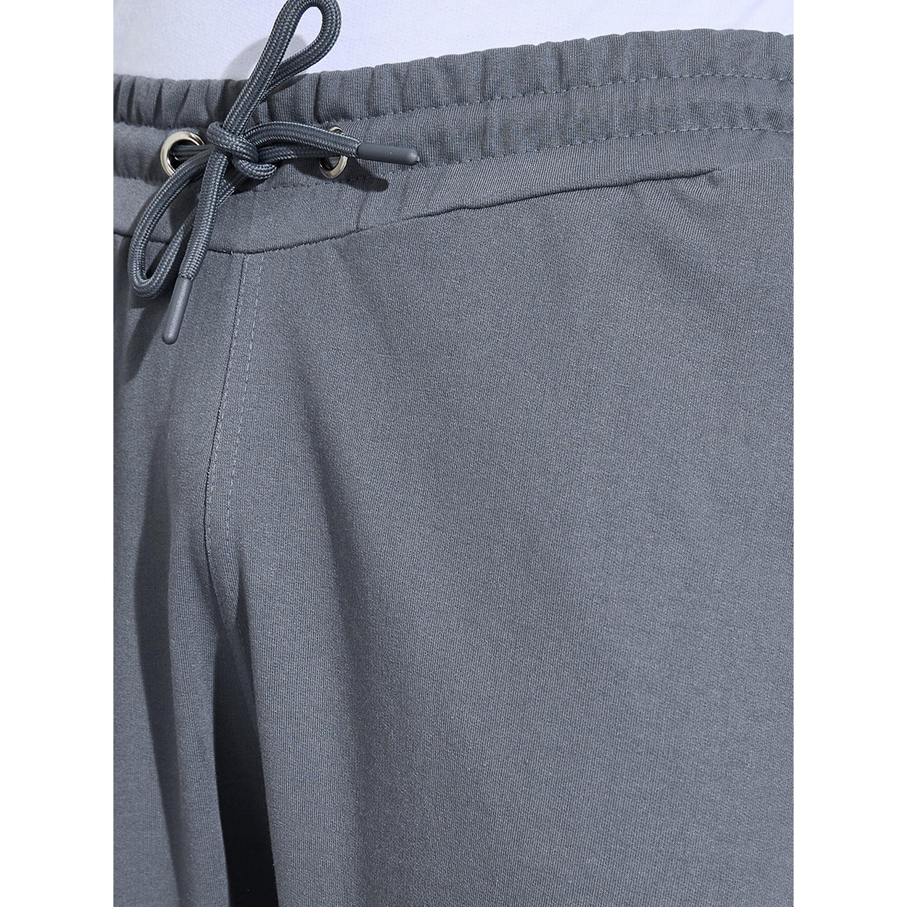 جوغر بقصة مريحة بجيوب بسحاب وأشرطة جانبية-men-clothing-joggers-image-3