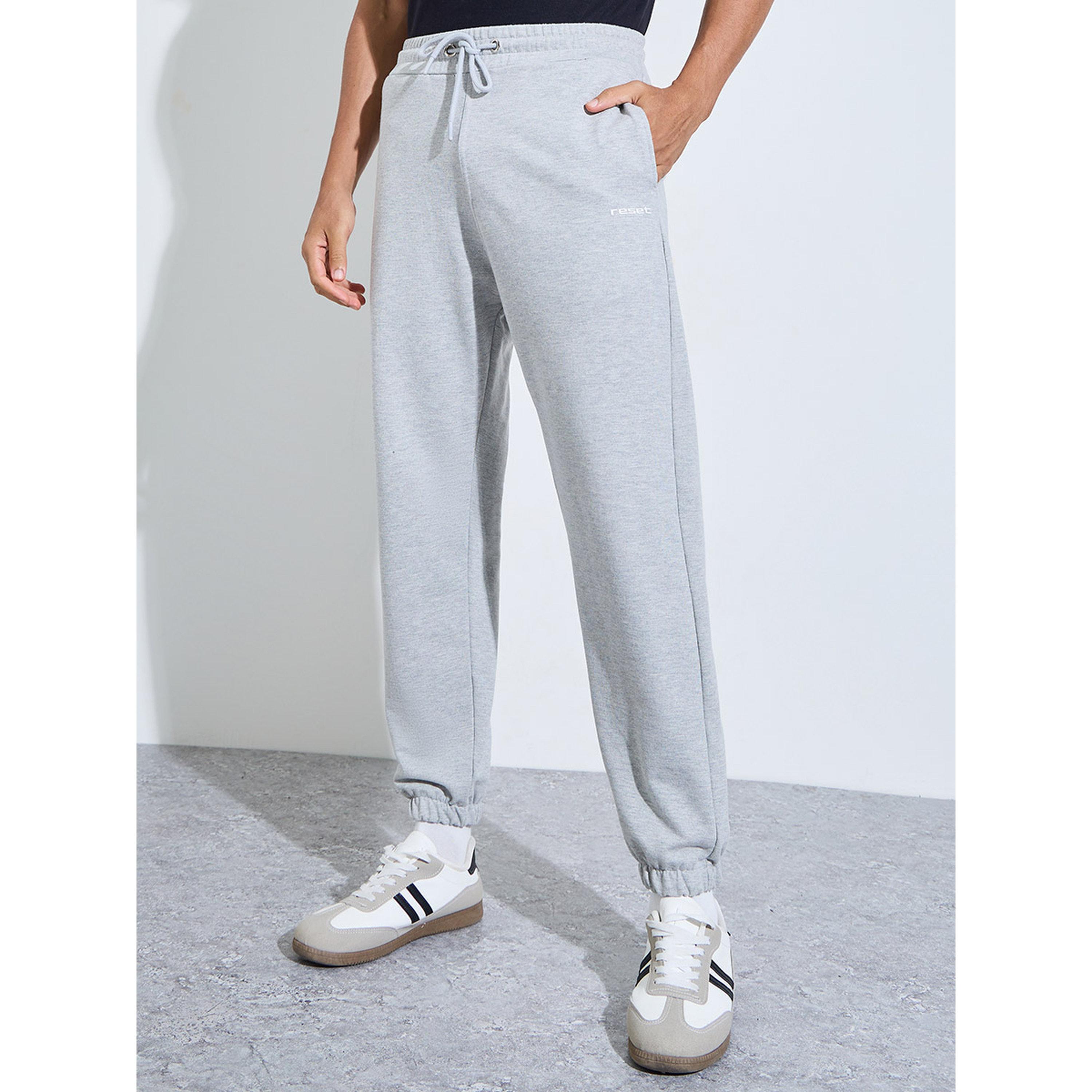 جوغر واسع بتفاصيل جيوب وطبعة شعار-men-clothing-joggers-image-1