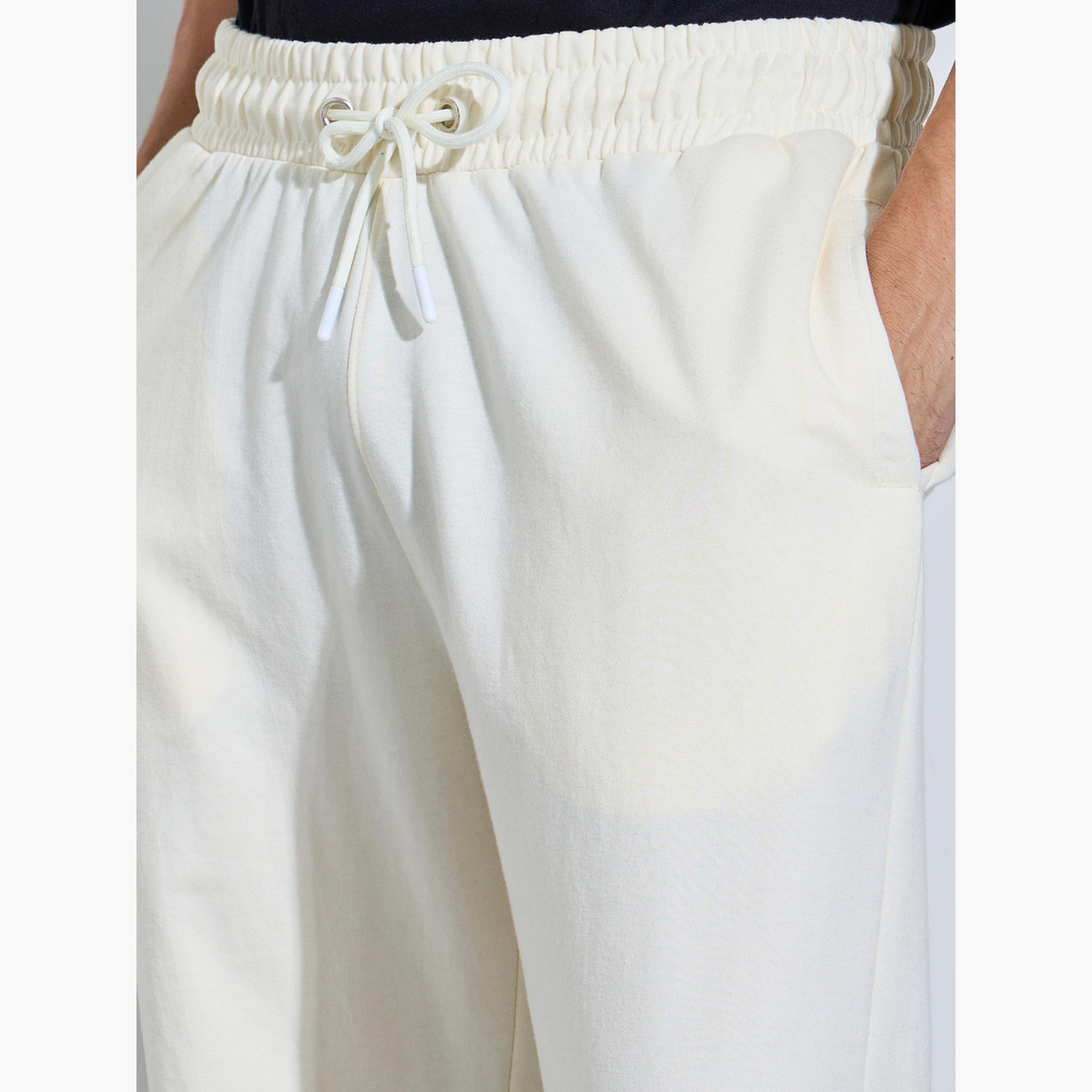 بنطال جوغر بقصة مريحة وجيب بأطراف متباينة وسادة-men-clothing-bottoms-joggers-image-4