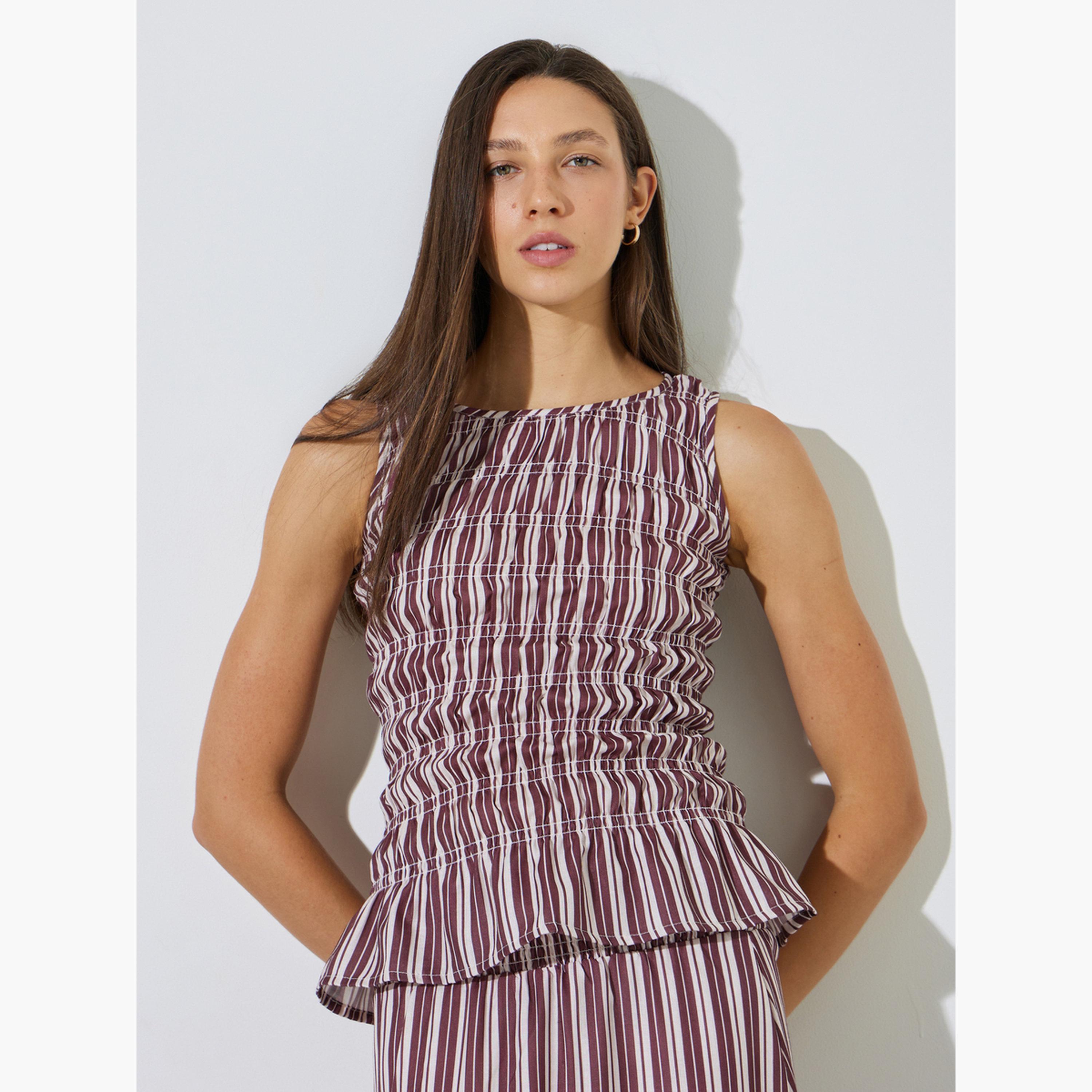 ستايلي - بلوزة بيبلوم بدون أكمام مخططة باللون العنابي-women-clothing-shirtsandblouses-blouses-image-1
