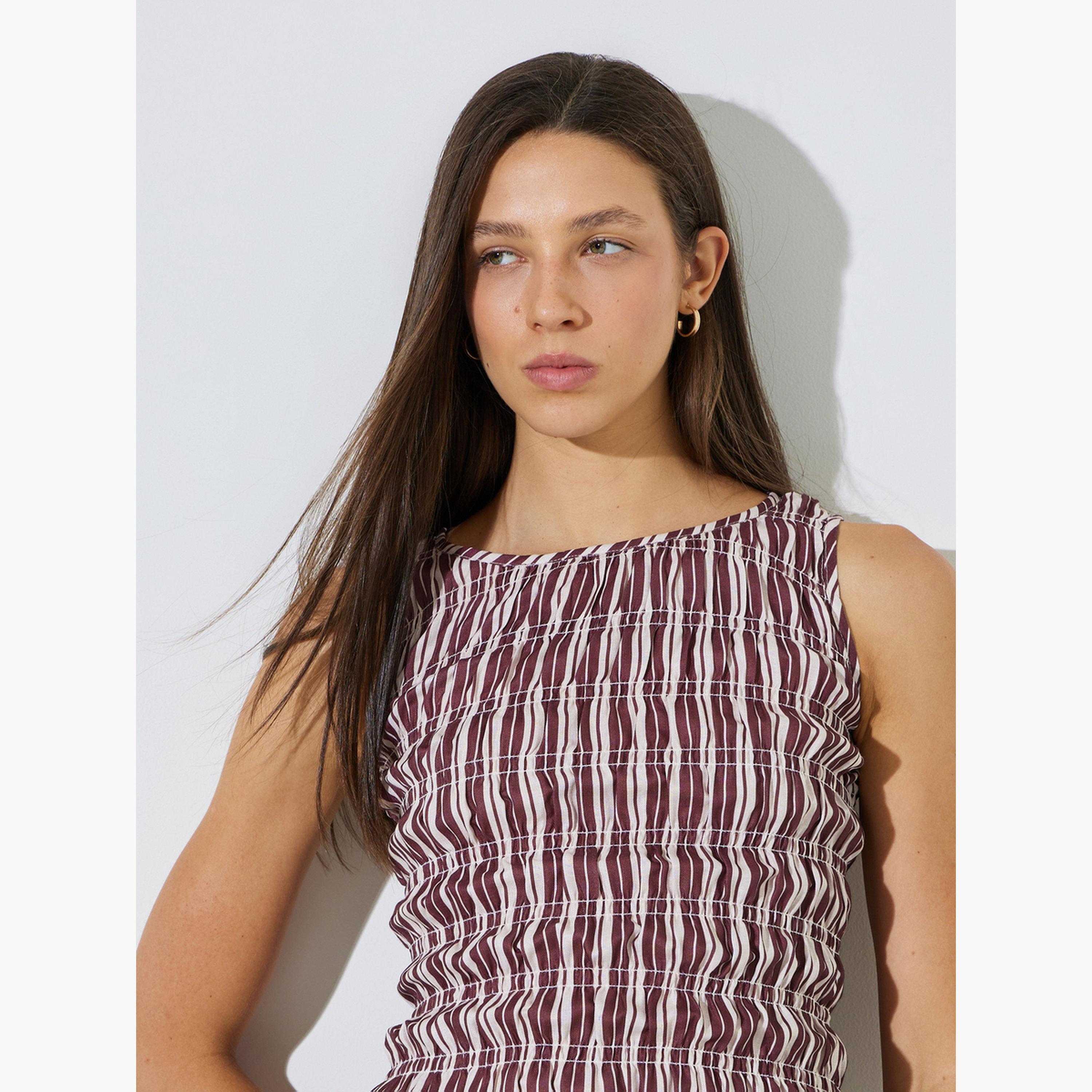 ستايلي - بلوزة بيبلوم بدون أكمام مخططة باللون العنابي-women-clothing-shirtsandblouses-blouses-image-3
