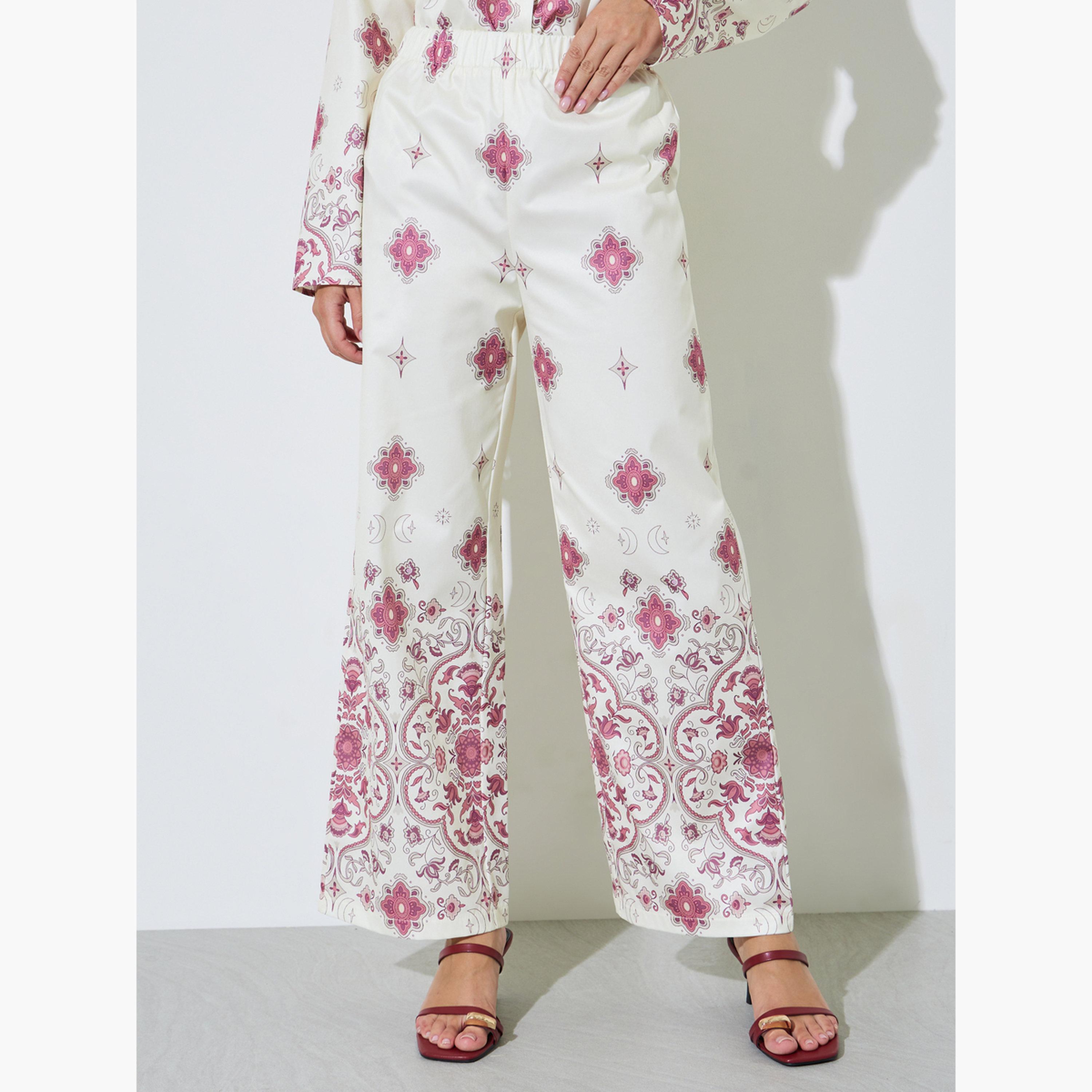 طقم منسق من بنطال بأرجل واسعة وبلوزة مطبوعة-women-clothing-coordsets-image-4