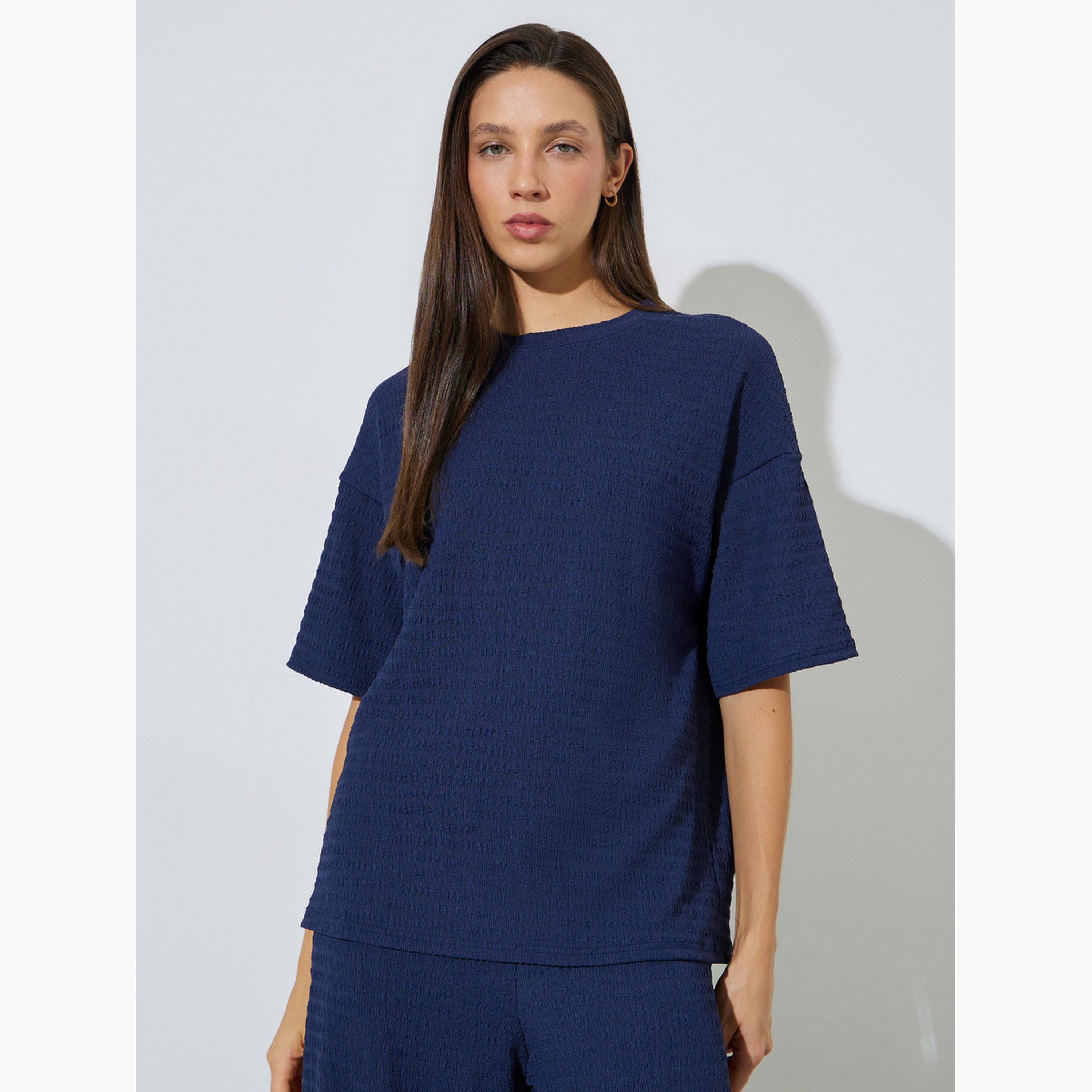 طقم منسق من بنطال بأرجل واسعة وبلوزة بتفاصيل بارزة الملمس-women-clothing-coordsets-image-3
