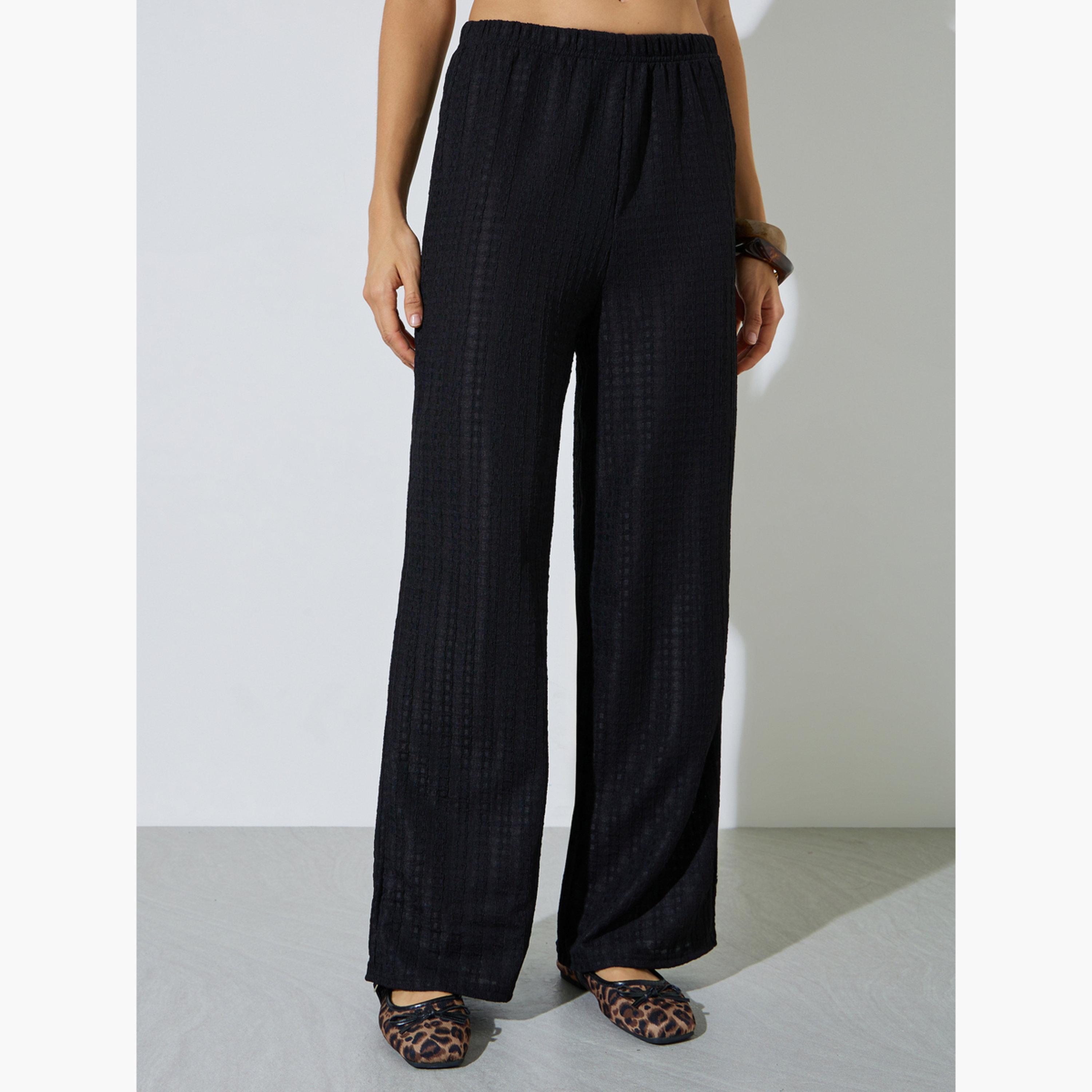 طقم منسق من بلوزة بتفاصيل بارزة الملمس بلا أكمام وبنطال-women-clothing-coordsets-image-5