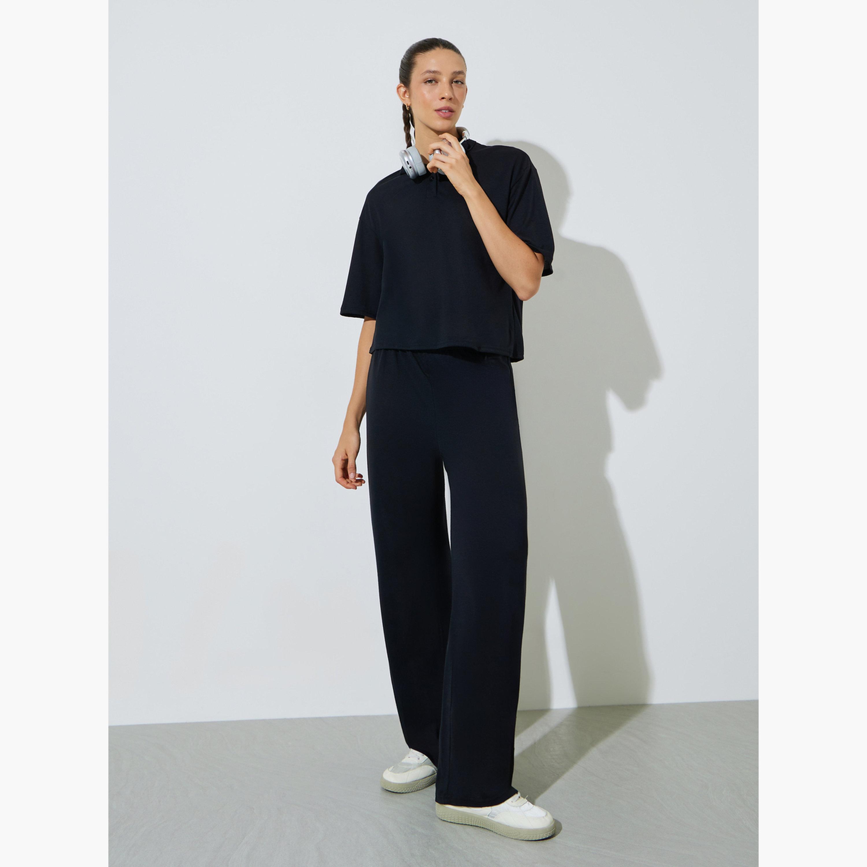 طقم منسق من جوغر بأرجل واسعة وبلوزة واسعة سادة-women-clothing-coordsets-image-1