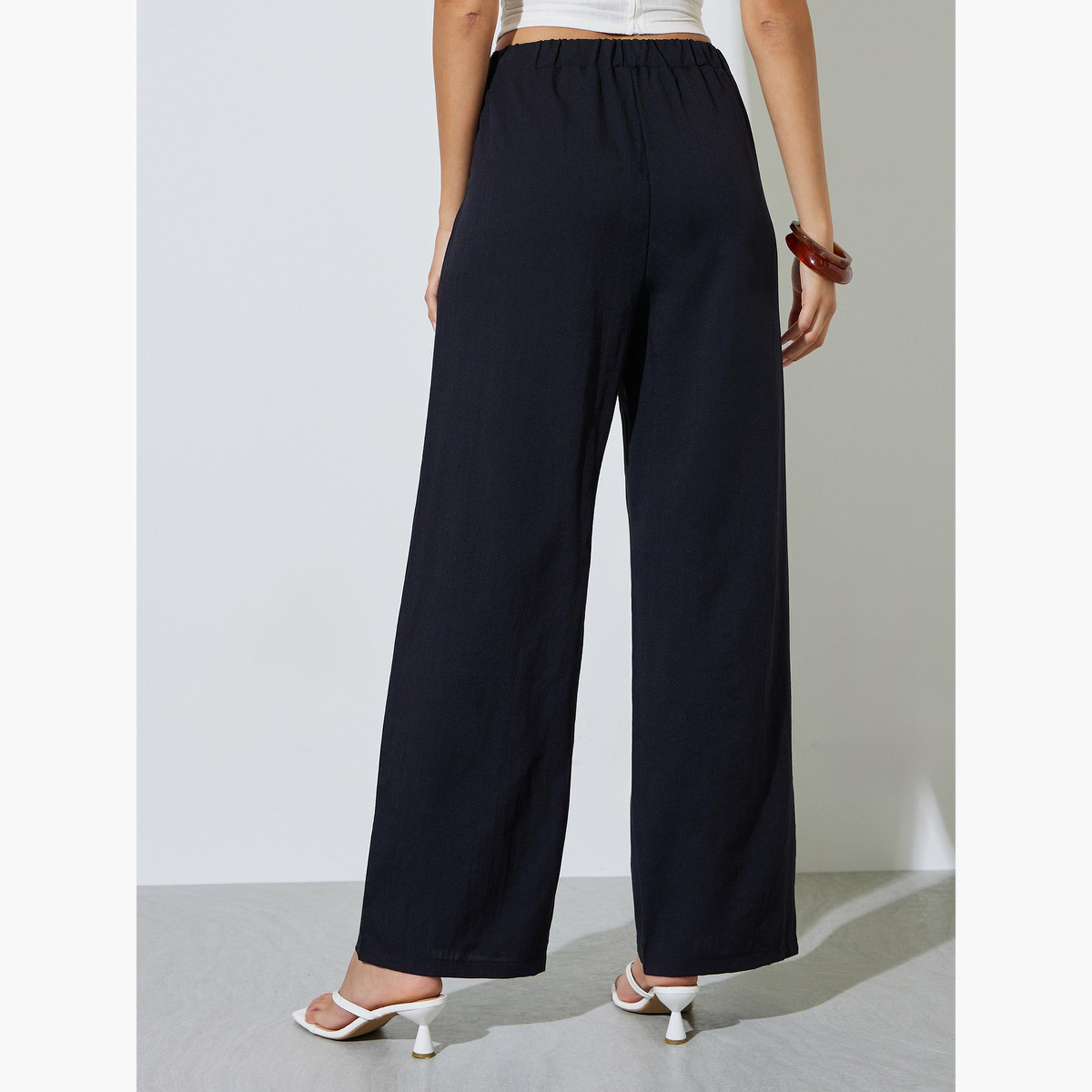 بنطال بأرجل واسعة وخصر مرن سادة-women-clothing-trousers-image-5