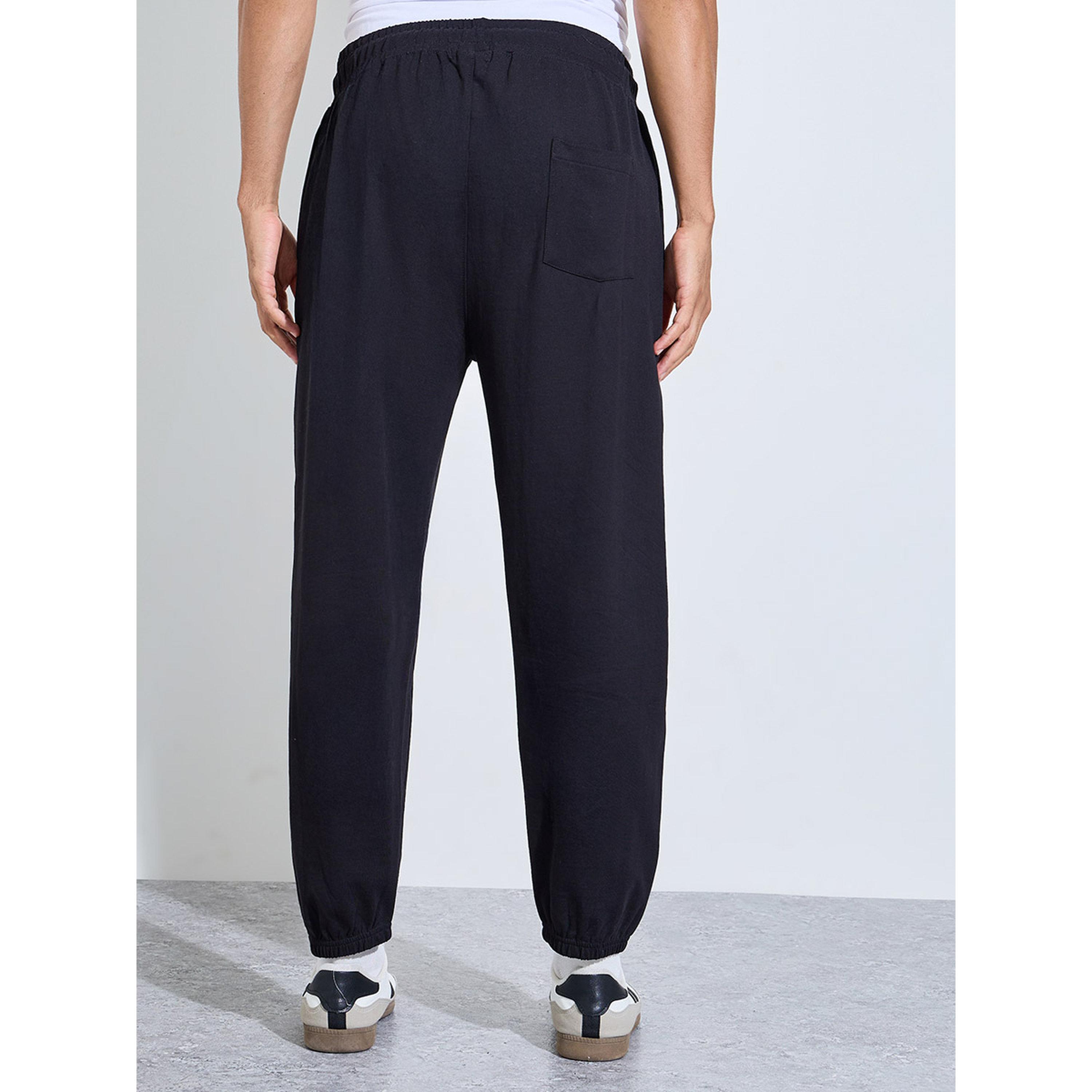 جوغر بقصة مريحة وحافة مطاطية بلون سادة-men-clothing-joggers-image-4