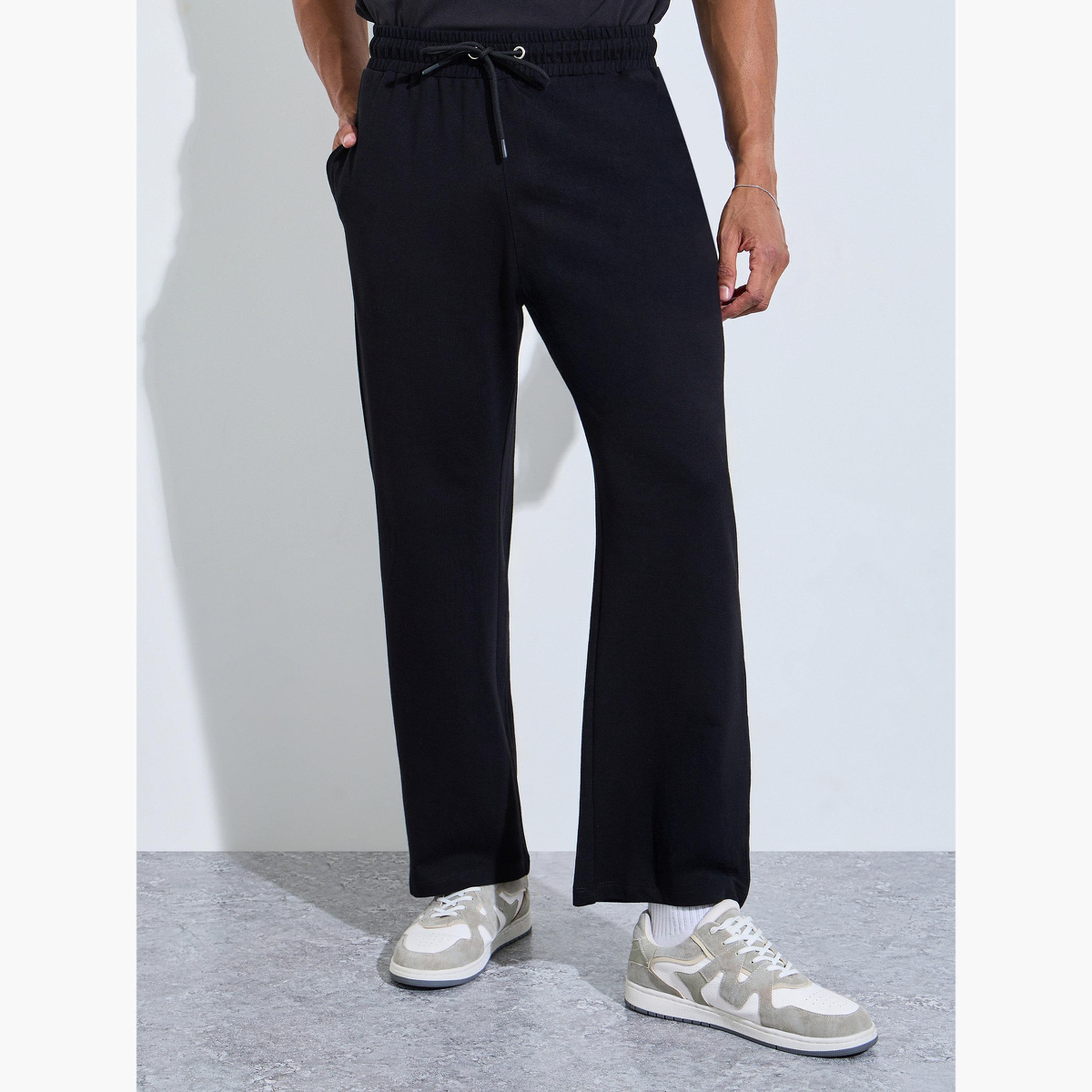 جوغر بقصة مريحة وحافة مفتوحة للرجال-men-clothing-bottoms-joggers-image-1