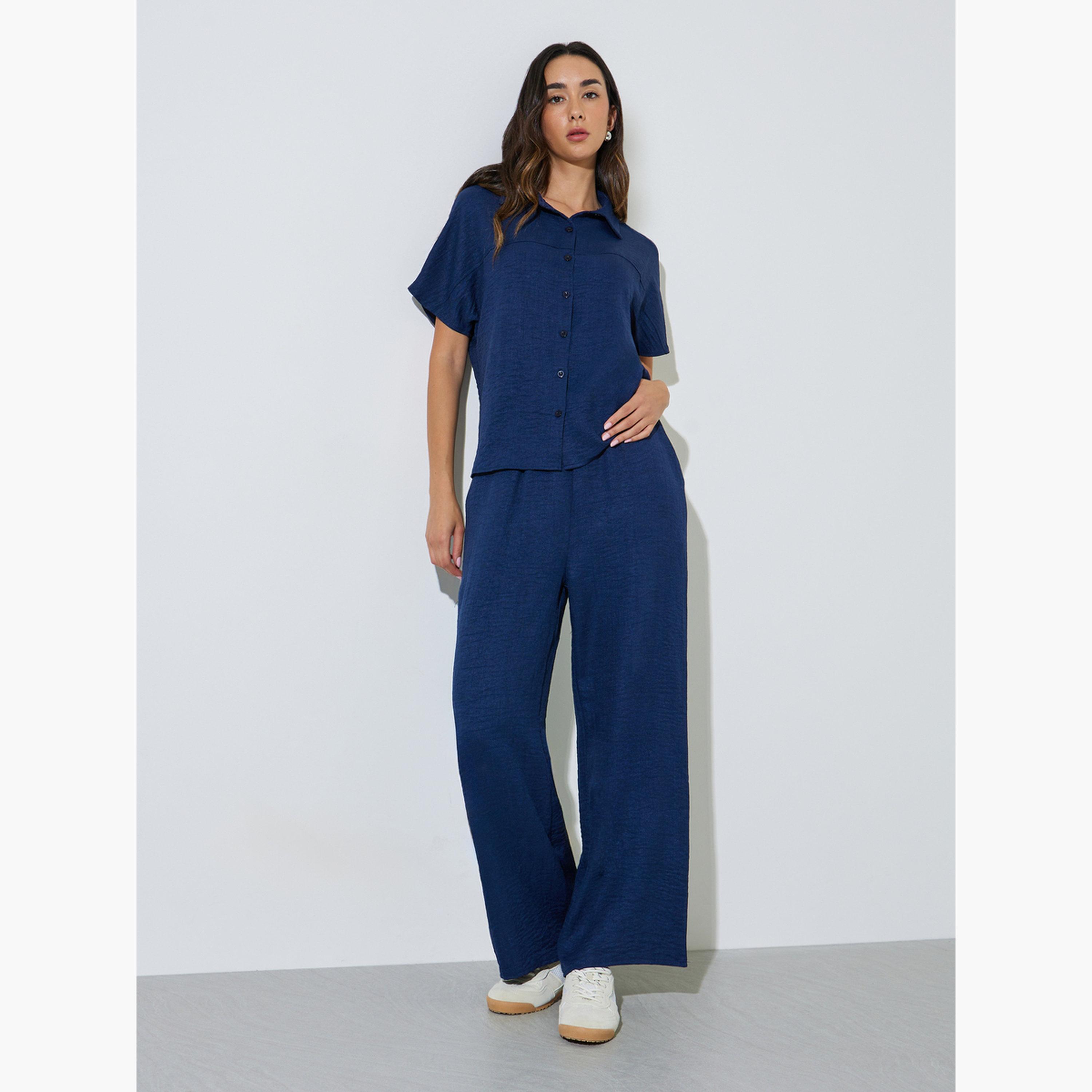مجموعة من بنطال بأرجل واسعة وبلوزة بأكتاف منخفضة-women-clothing-coordsets-image-1