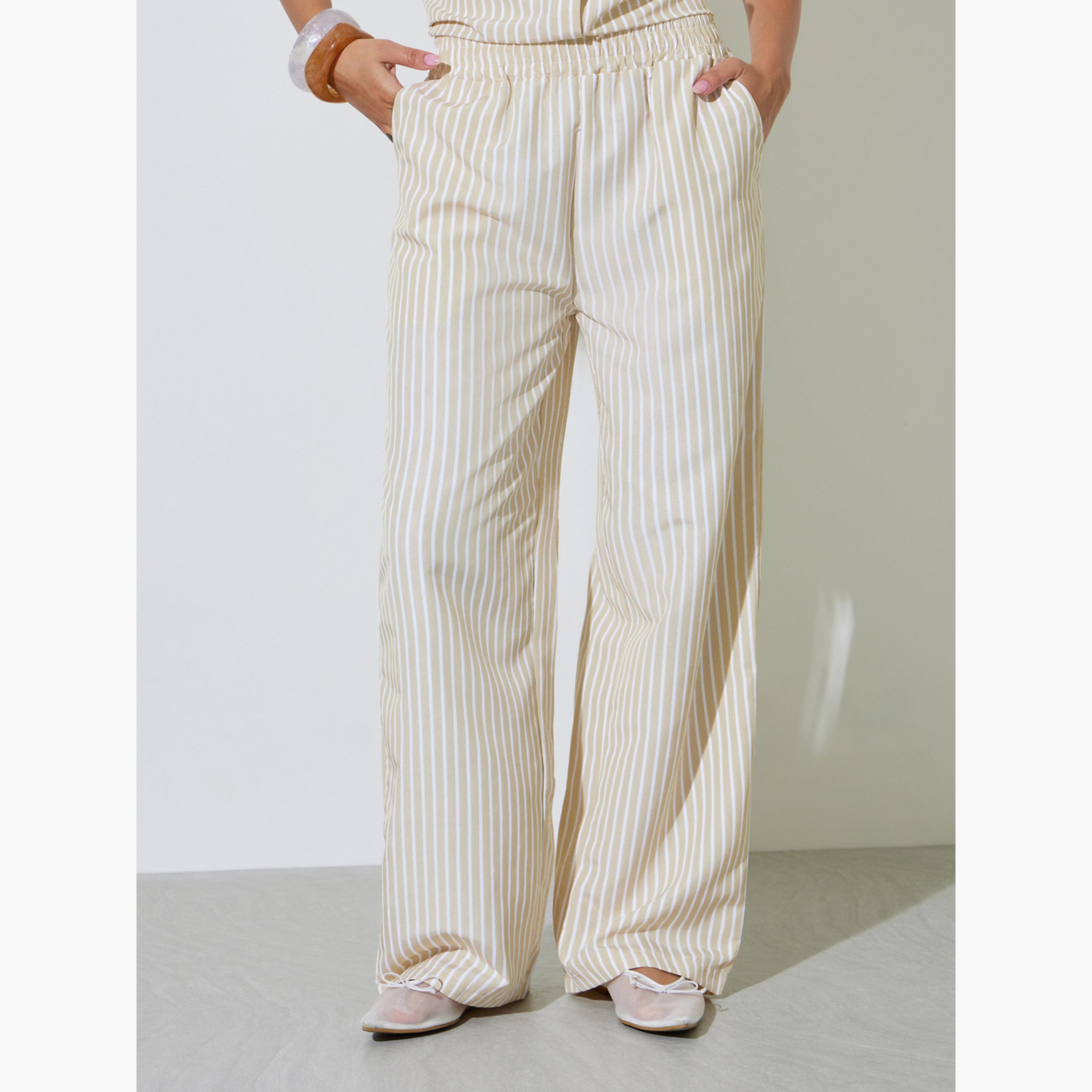 مجموعة من بنطال بأرجل واسعة وبلوزة مخططة بأكمام قصيرة-women-clothing-coordsets-image-5