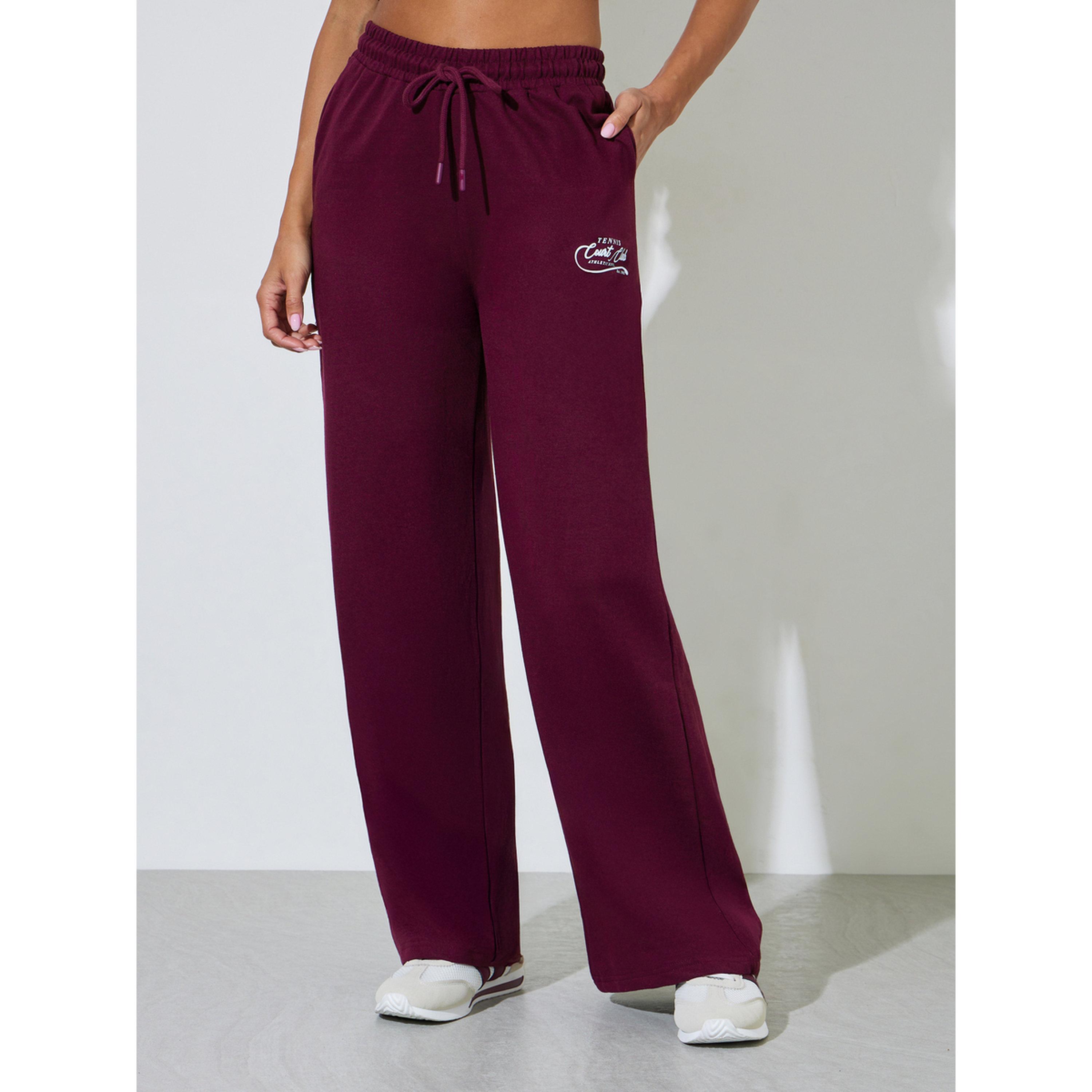 Styli Burgundy Slogan Print Wide Leg Joggers-women-clothing-joggers-image-1