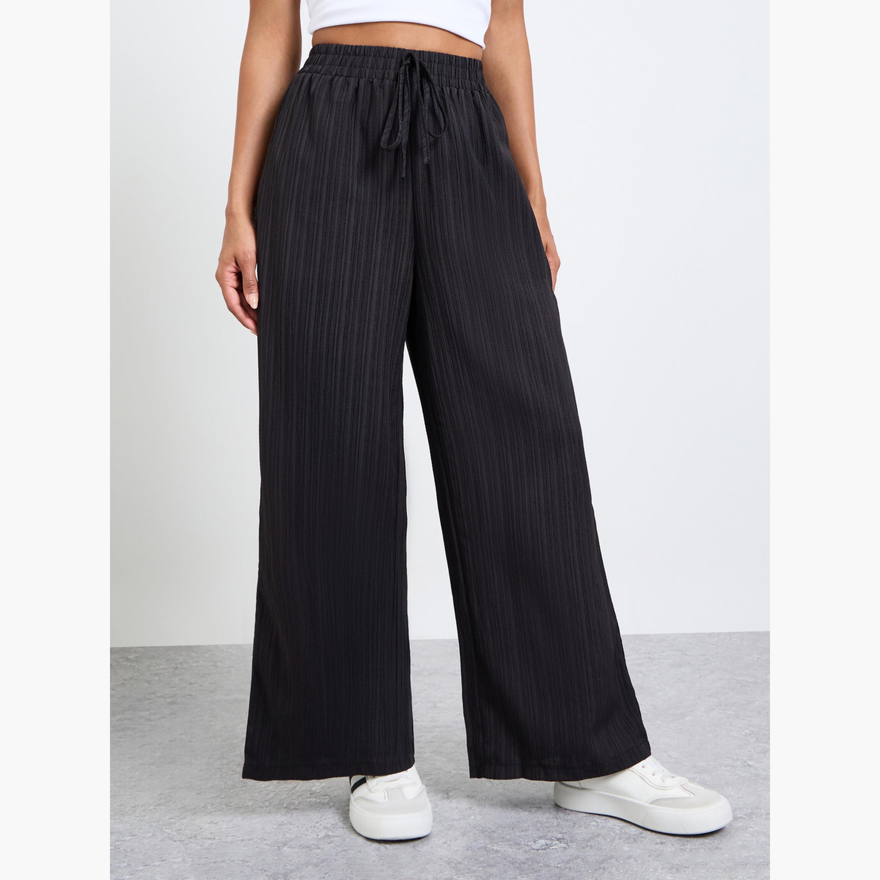 تيك تو - بنطال أسود واسع الساقين بنقشة مميزة-women-clothing-bottoms-joggers-image-1