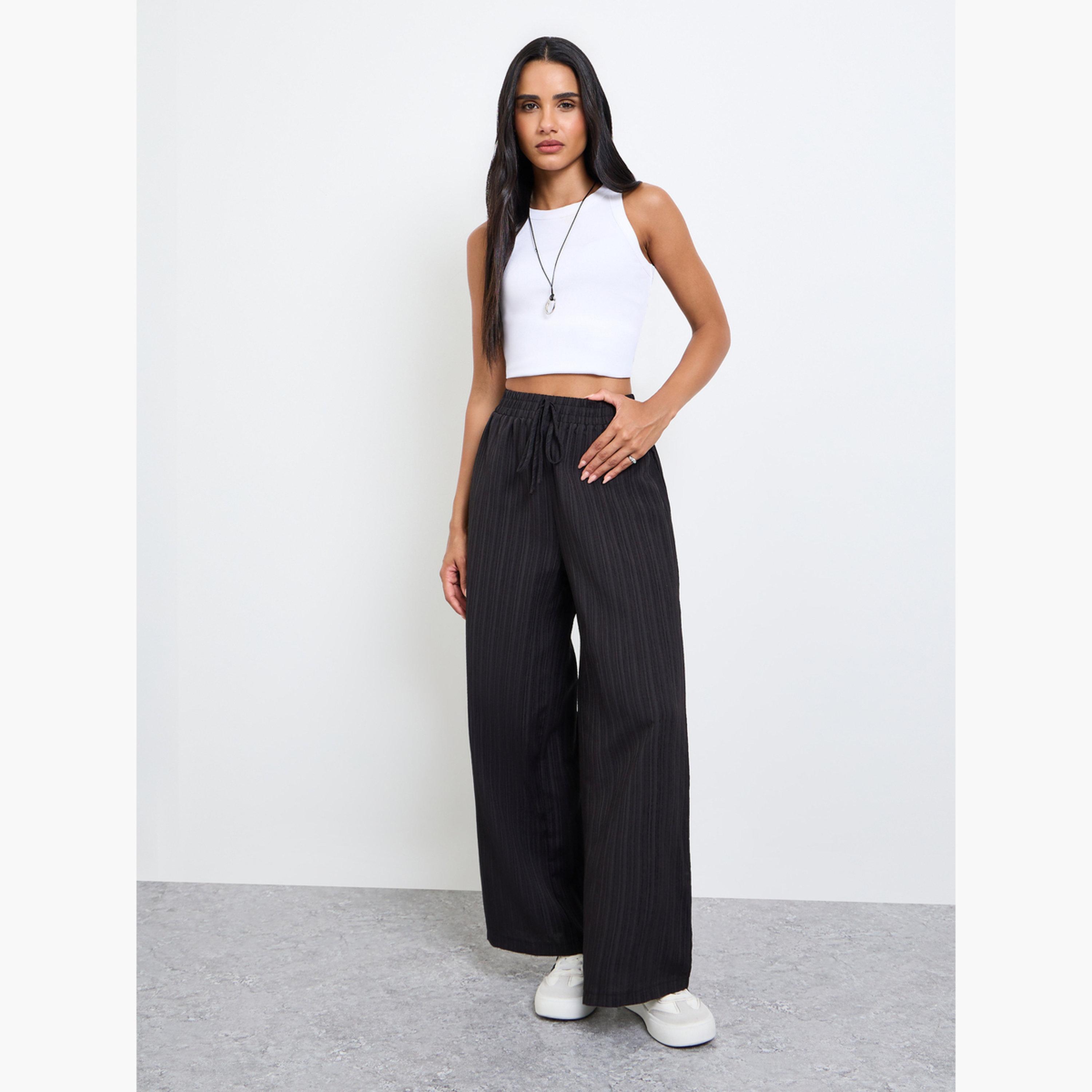 تيك تو - بنطال أسود واسع الساقين بنقشة مميزة-women-clothing-bottoms-joggers-image-2