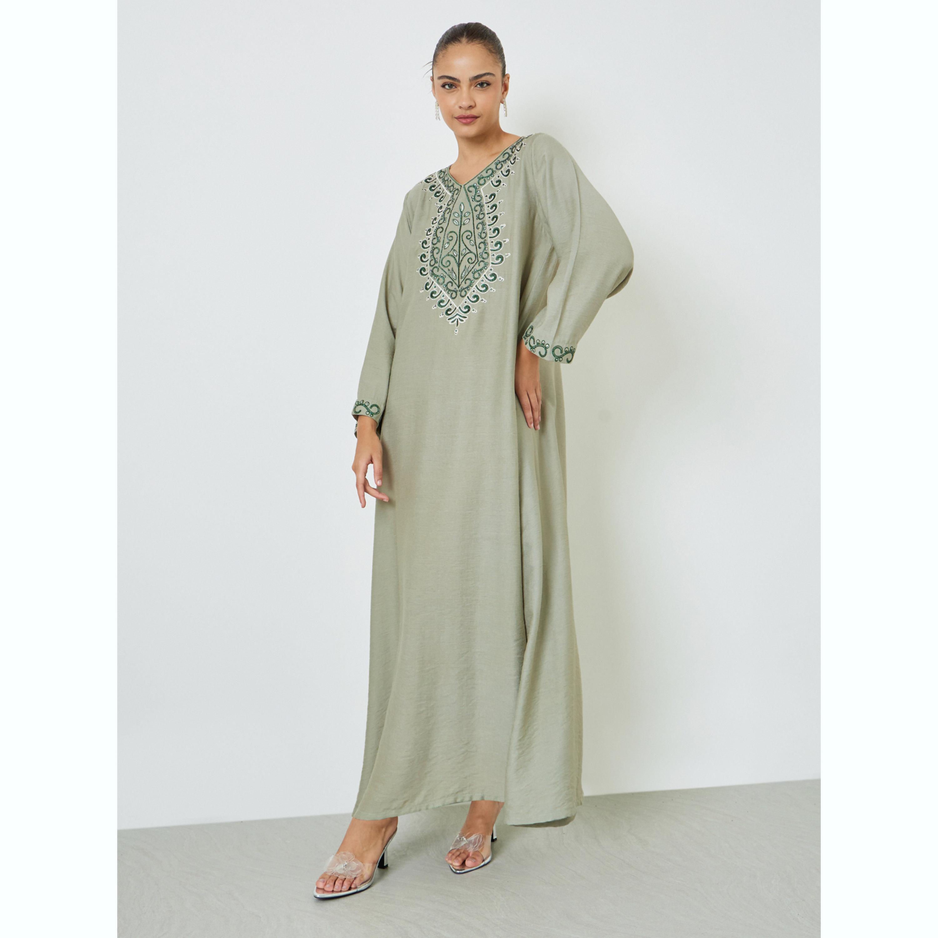 جلابية خضراء بتفاصيل مُطرّزة على القبة وتزيينات-women-arabicclothing-jalabiyas-image-1
