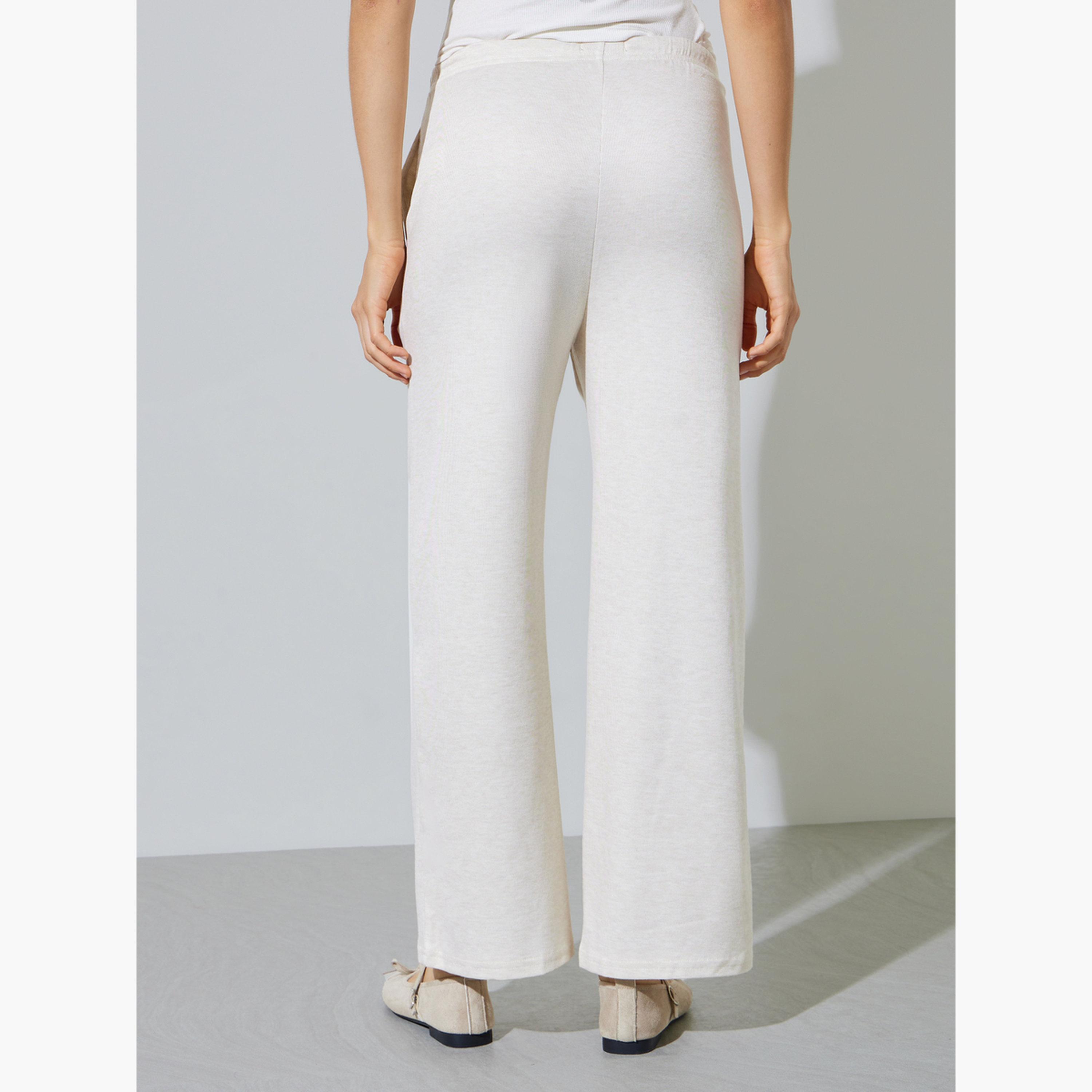 ستايلي - بنطال واسع الساقين بلون أبيض كريمي مع جيب جانبي-women-clothing-bottoms-joggers-image-4