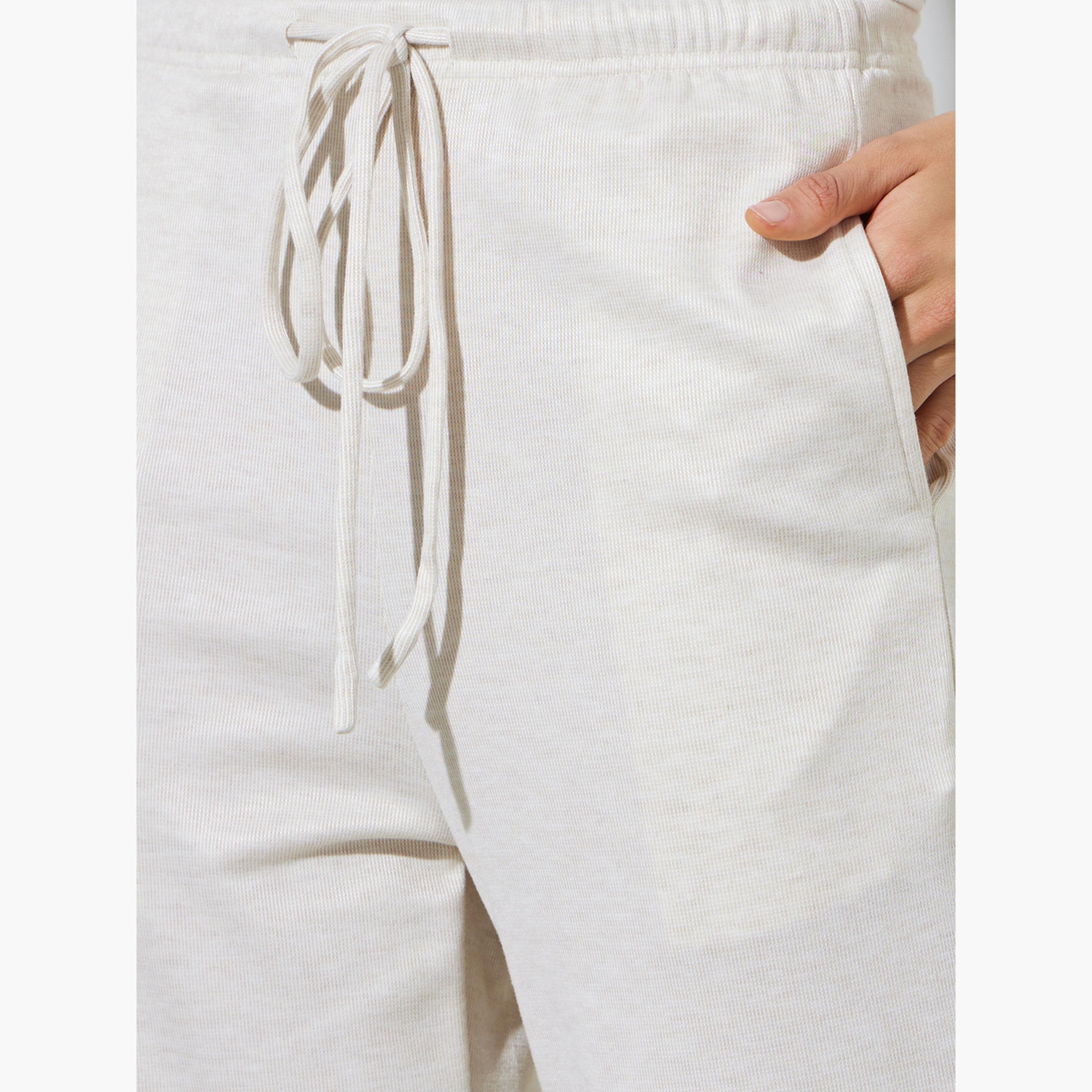 ستايلي - بنطال واسع الساقين بلون أبيض كريمي مع جيب جانبي-women-clothing-bottoms-joggers-image-5