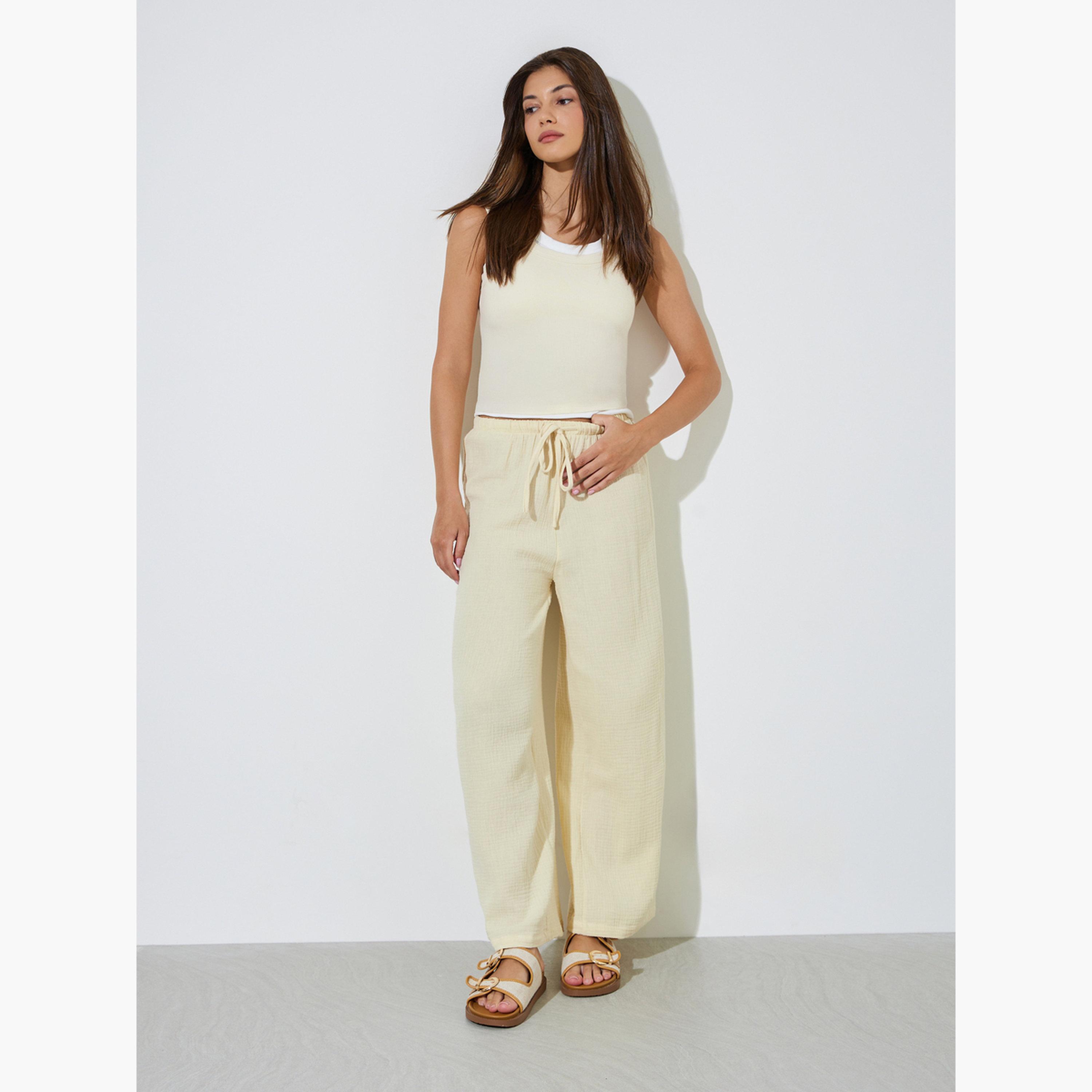 بنطال قطن بأرجل واسعة ورباط بيج-women-clothing-trousers-image-2