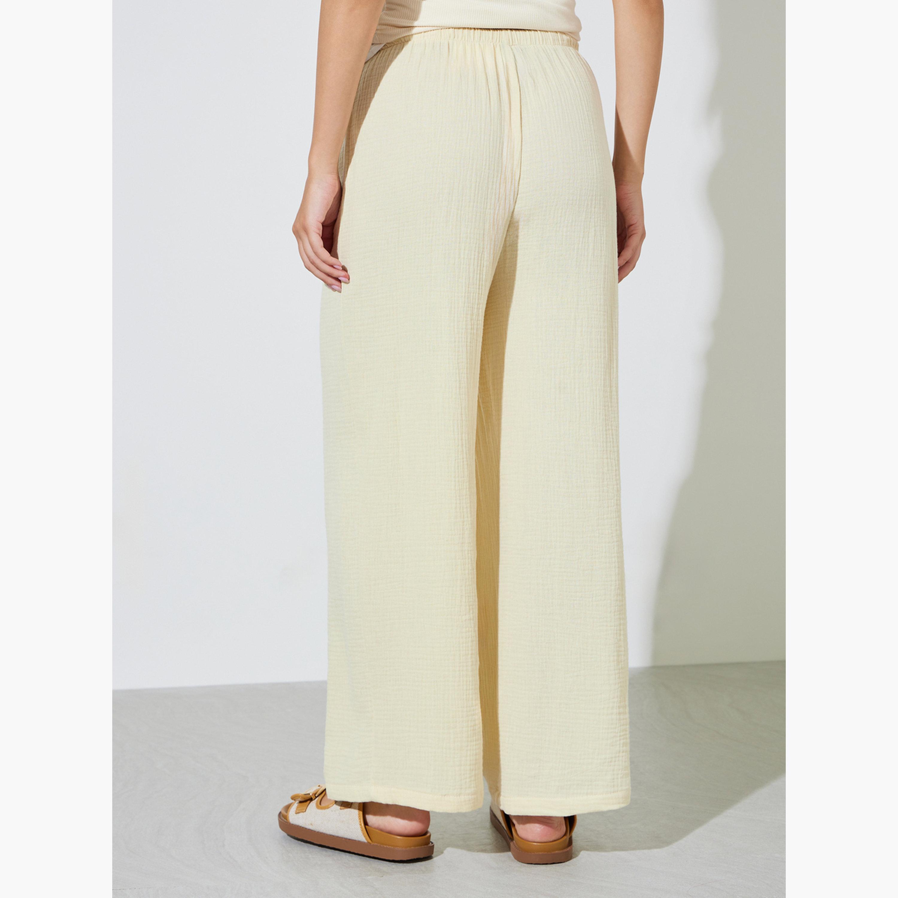 بنطال قطن بأرجل واسعة ورباط بيج-women-clothing-trousers-image-4