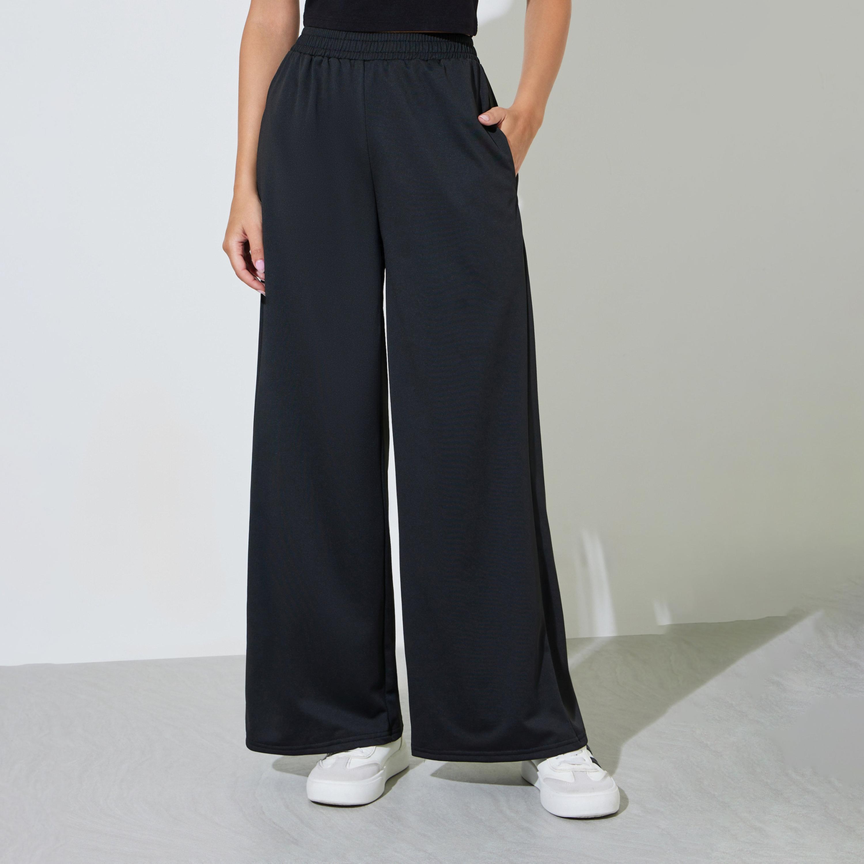 بنطال بأرجل واسعة مع حزام خصر مطاطي-women-clothing-trousers-image-1