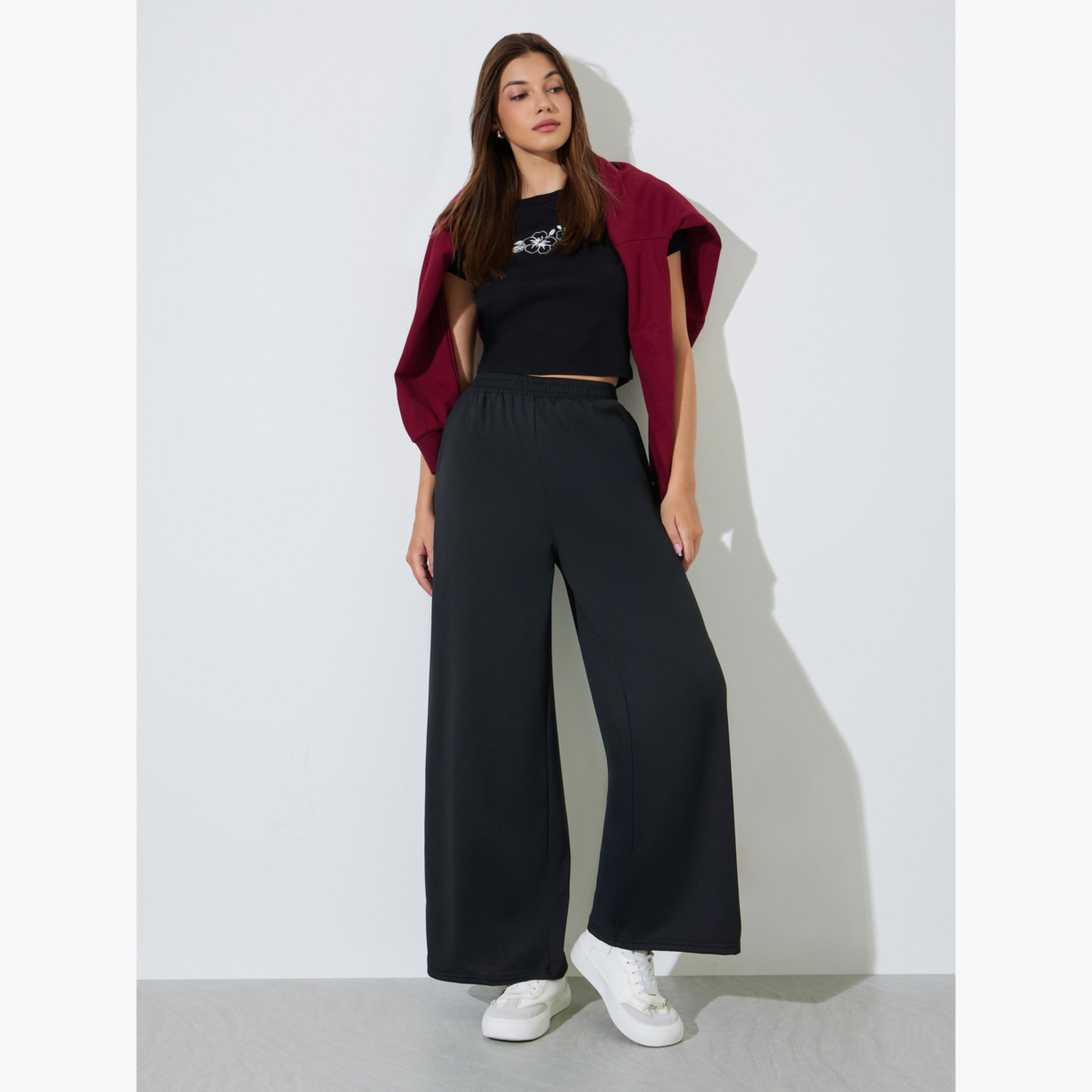 بنطال بأرجل واسعة مع حزام خصر مطاطي-women-clothing-trousers-image-2