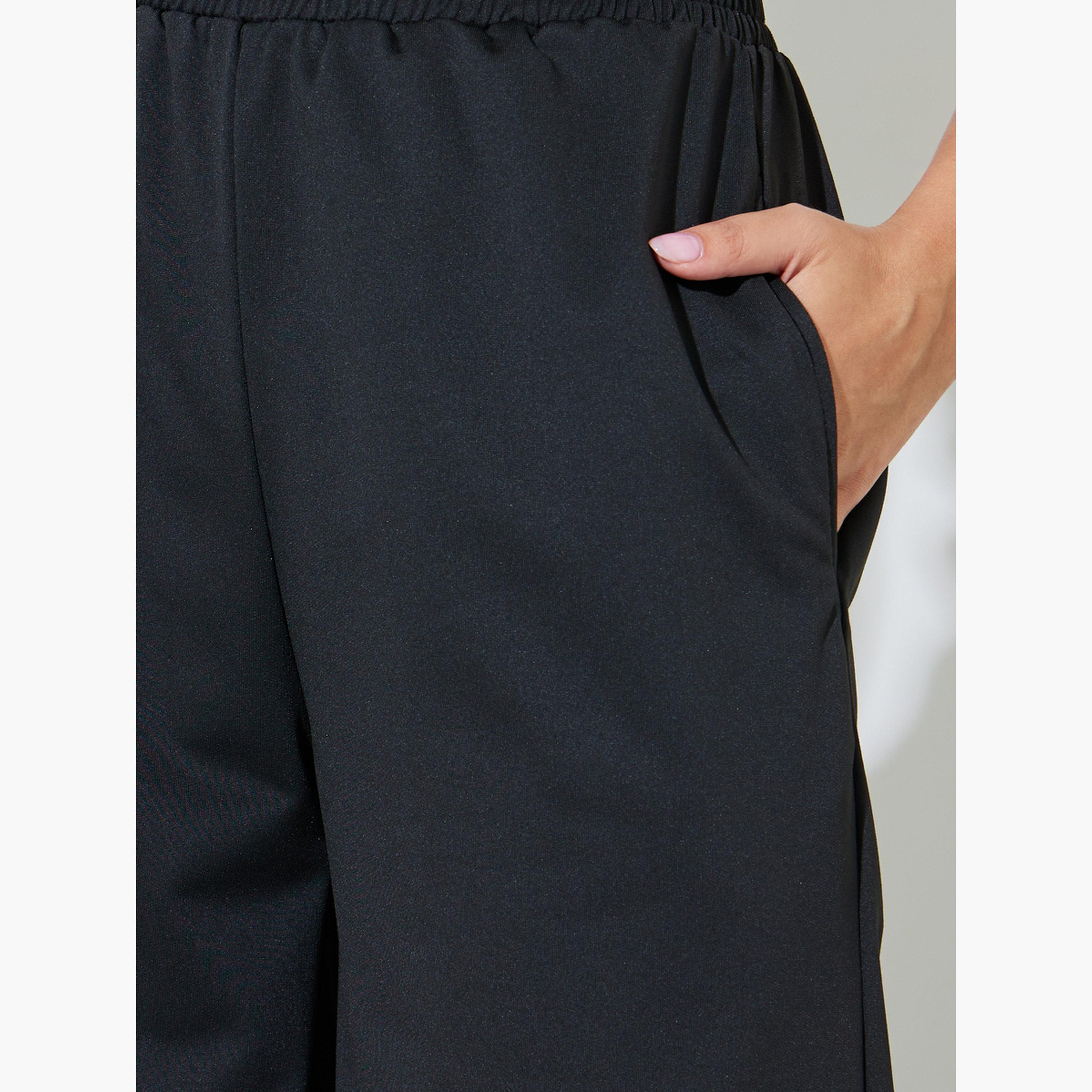 بنطال بأرجل واسعة مع حزام خصر مطاطي-women-clothing-trousers-image-3