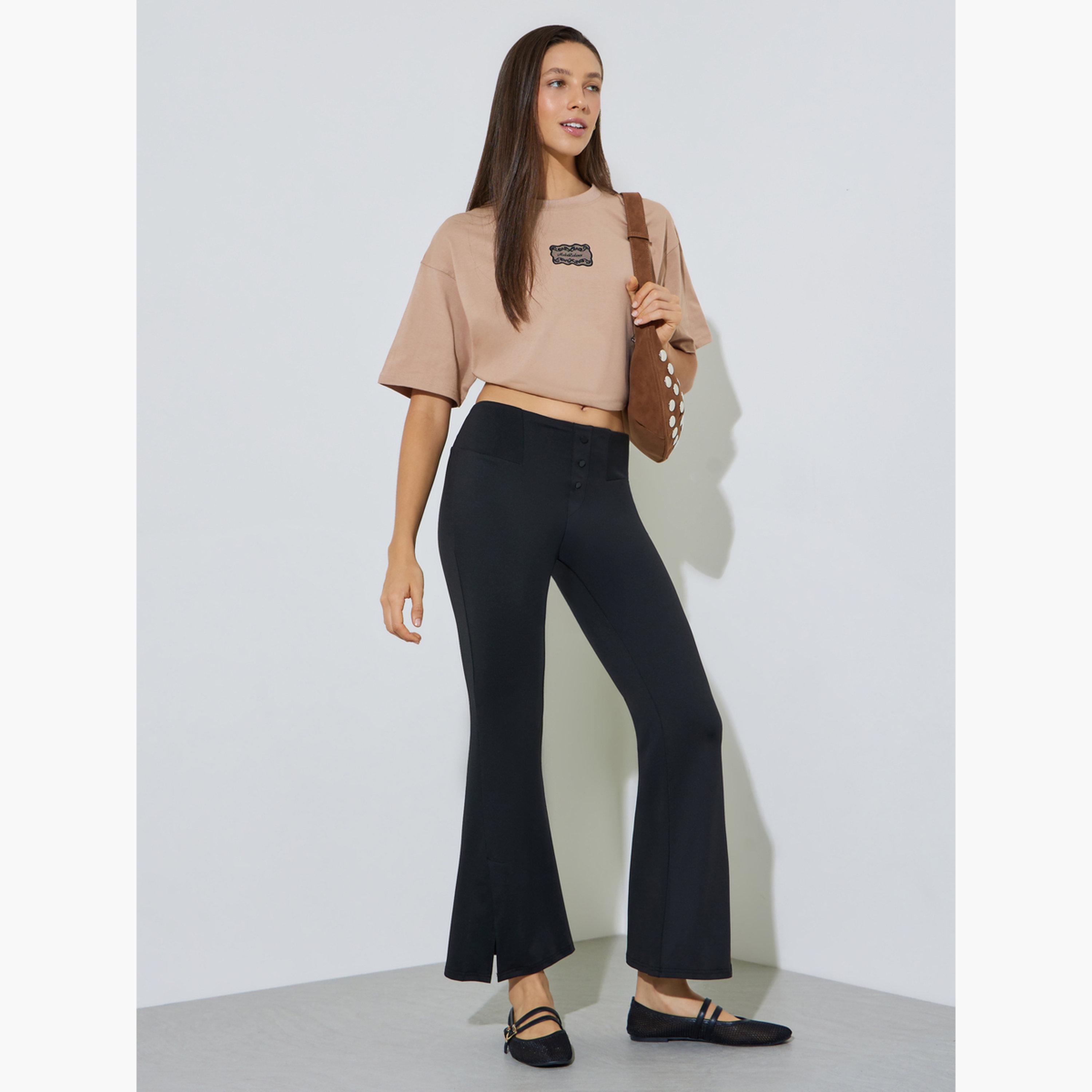 Styli Black Solid Flared Pants with Button Detail-women-clothing-bottoms-joggers-image-2
