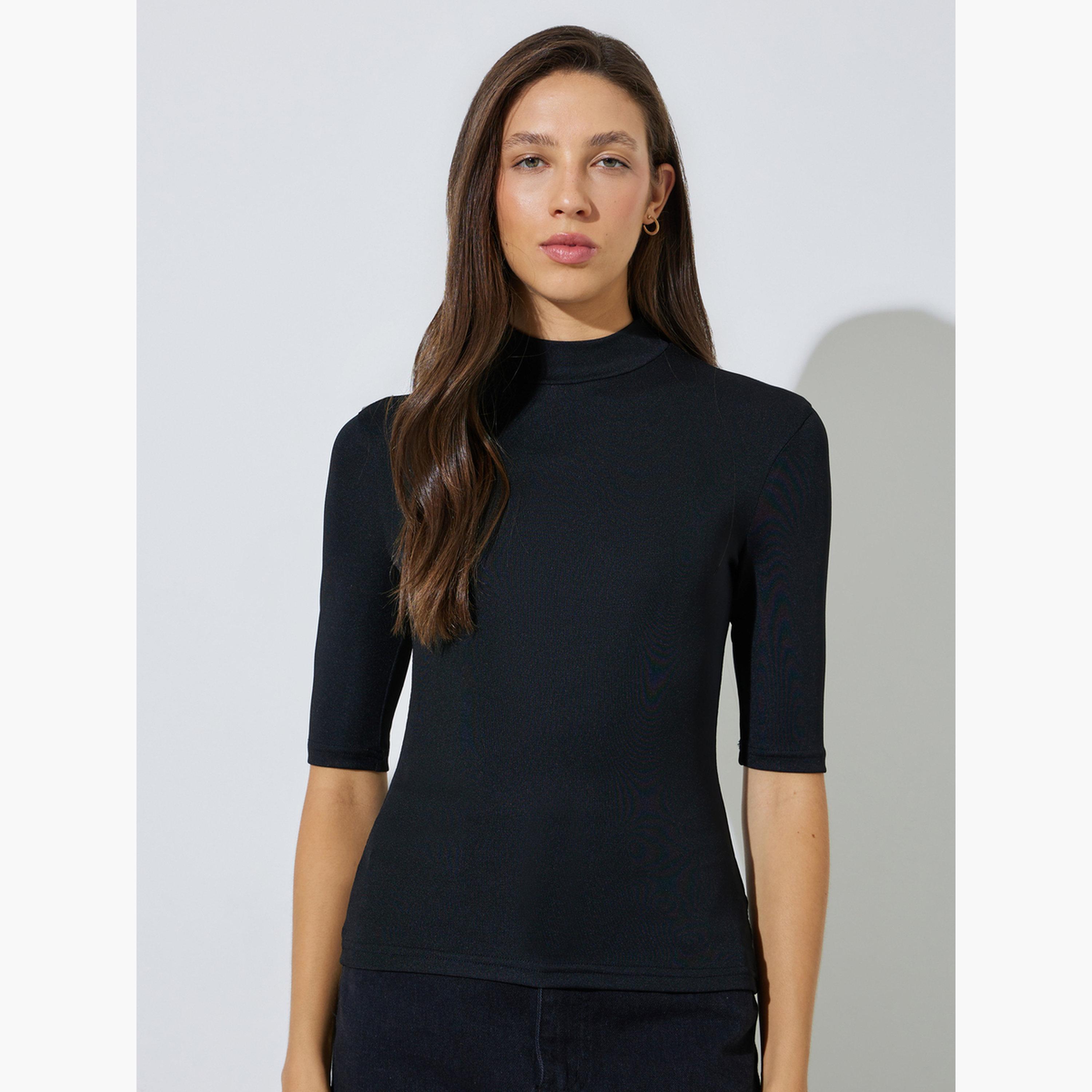 طقم من قطعتين بلوزة محبوكة ضيقة بياقة عالية وأكمام نصفية-women-clothing-tshirts-image-3