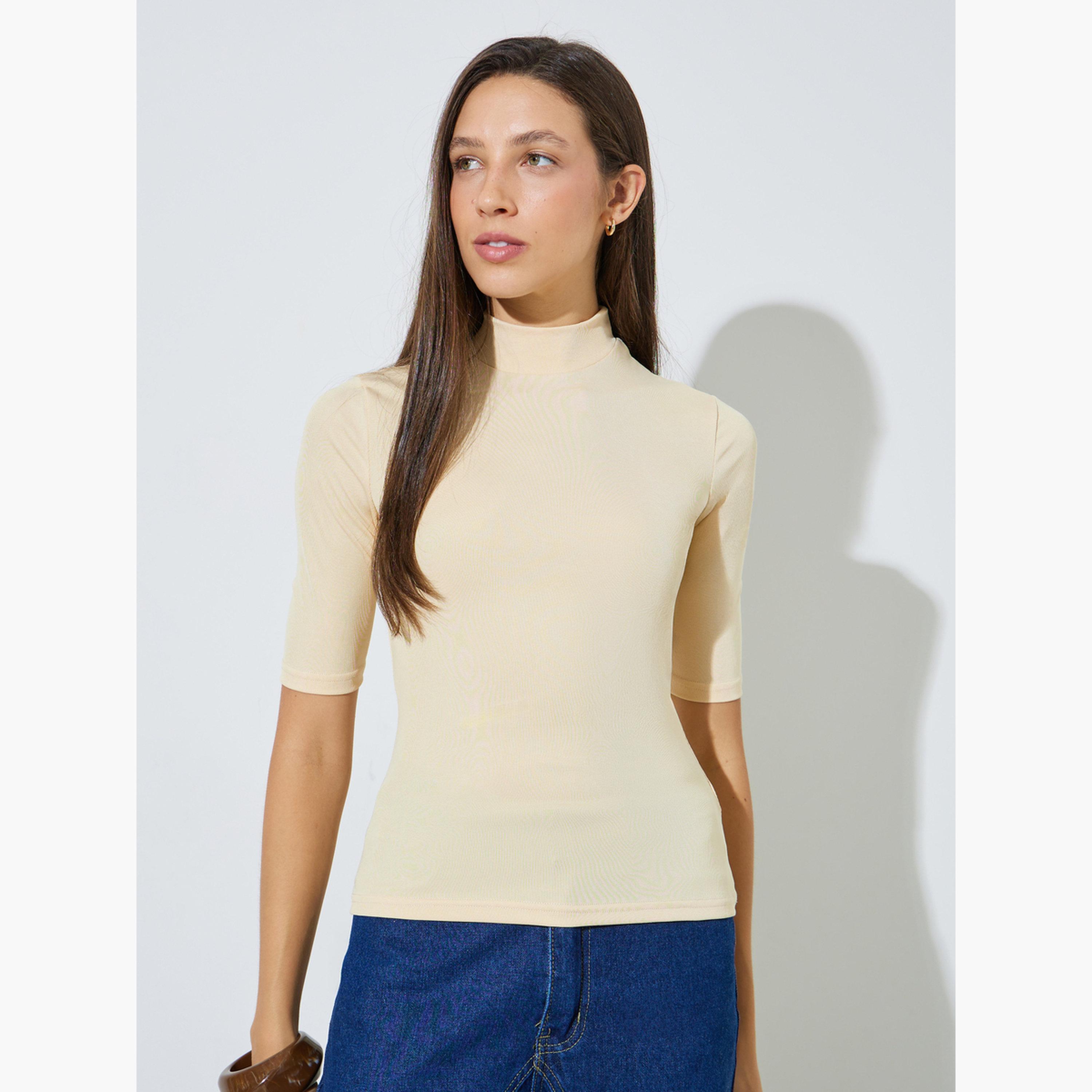 طقم من قطعتين بلوزة محبوكة ضيقة بياقة عالية وأكمام نصفية-women-clothing-tshirts-image-6