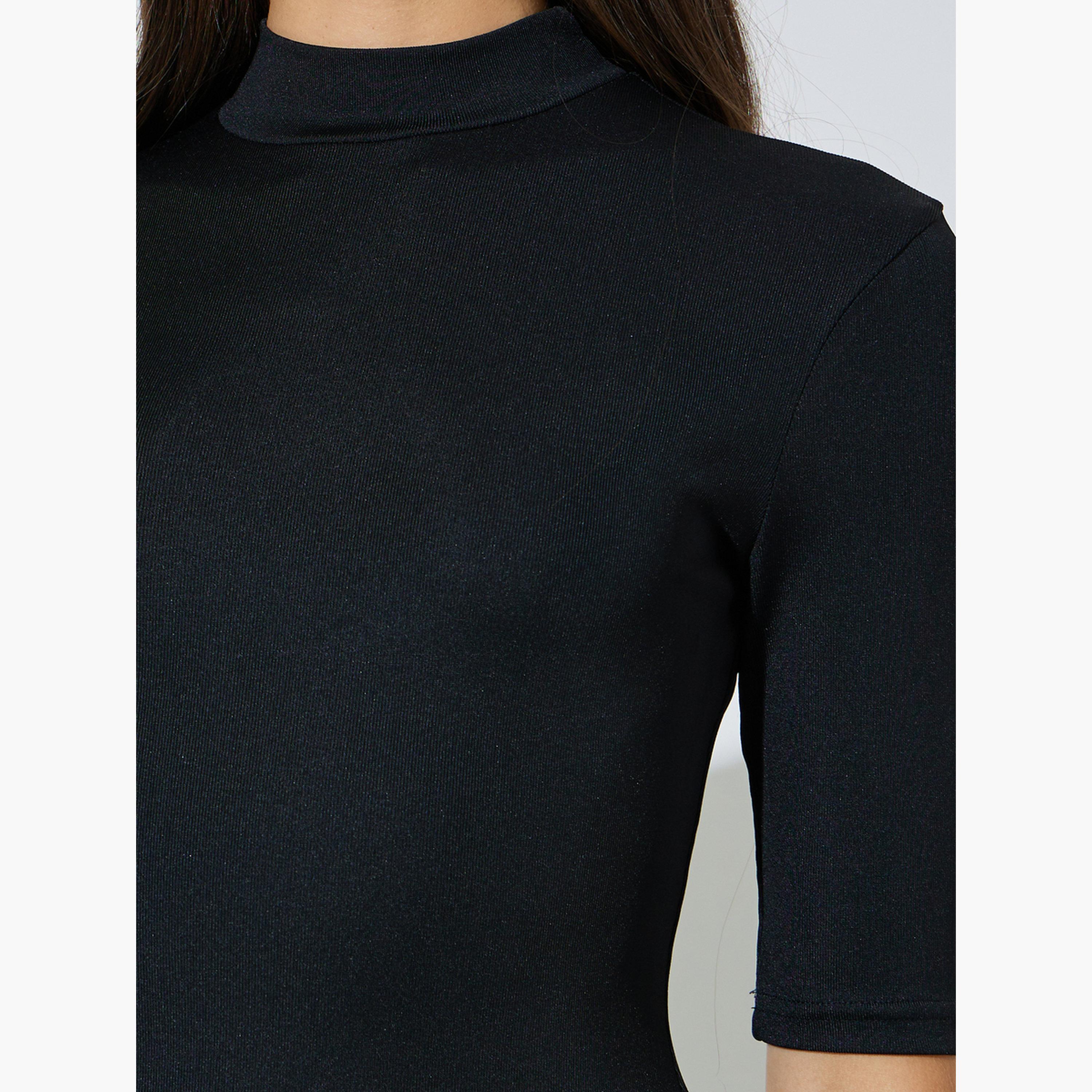 طقم من قطعتين بلوزة محبوكة ضيقة بياقة عالية وأكمام نصفية-women-clothing-tshirts-image-7