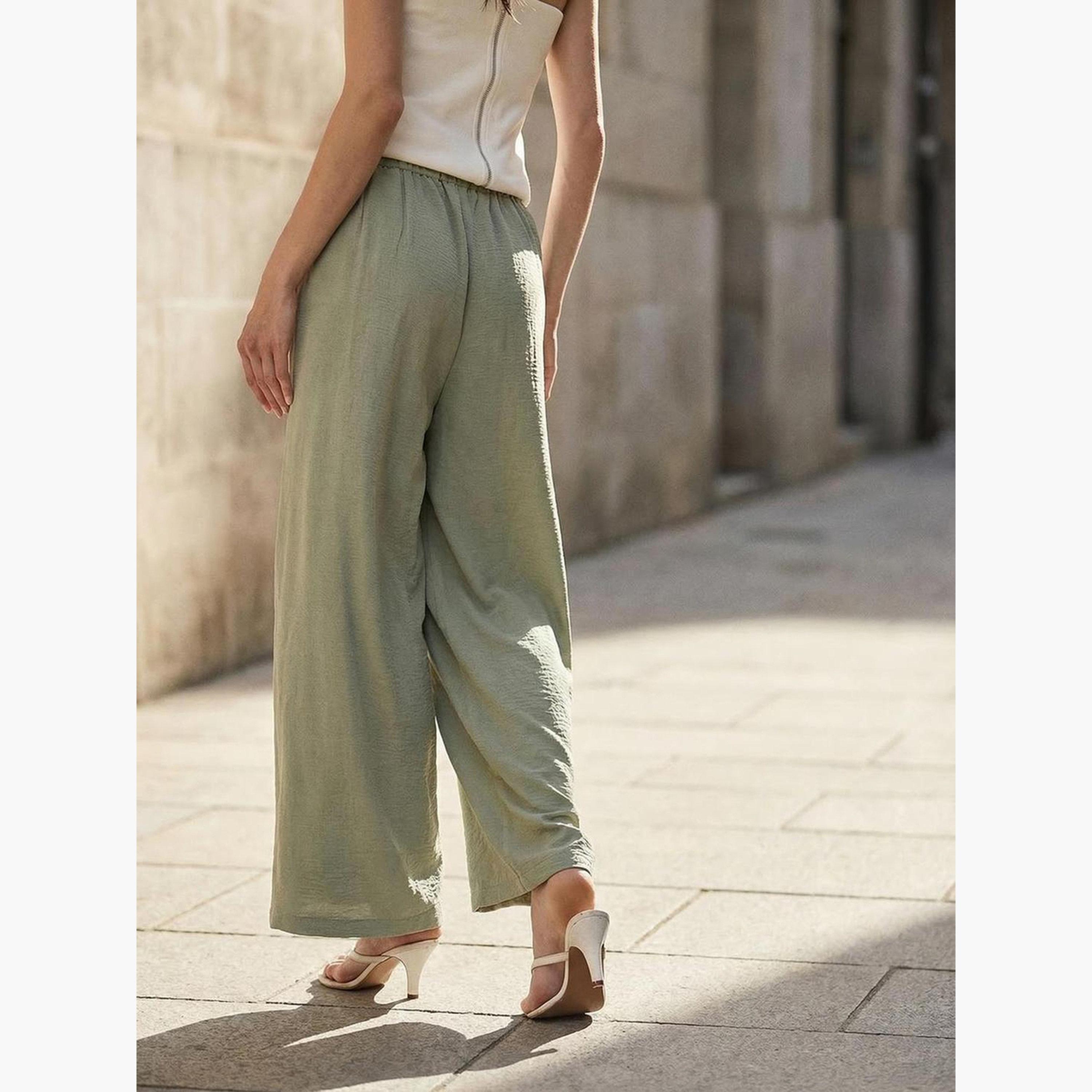 بنطال سادة بقصة مريحة زيتي فاتح-women-clothing-bottoms-joggers-image-6